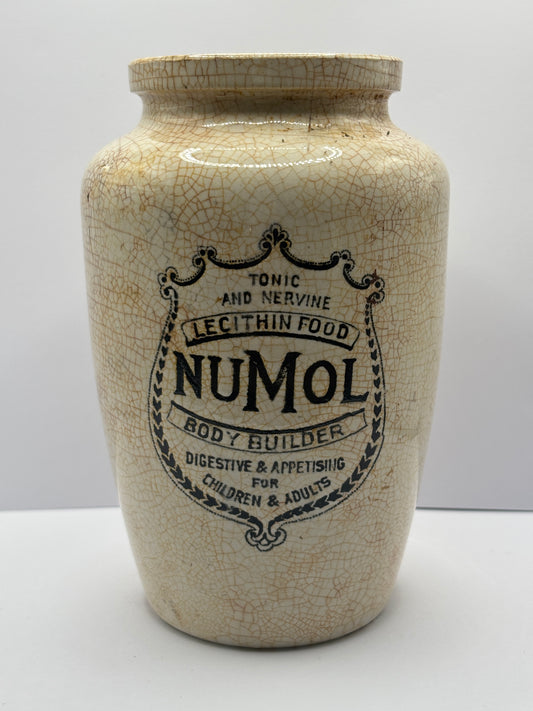 Old stained & crazed numol body builder advertising jar, 14cms