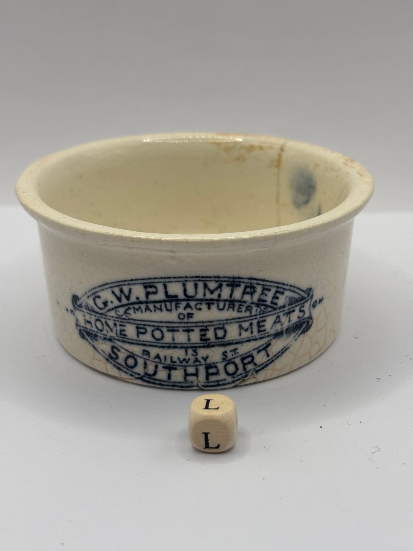 Old advertising meat paste pot, plumtrees (L) hairline