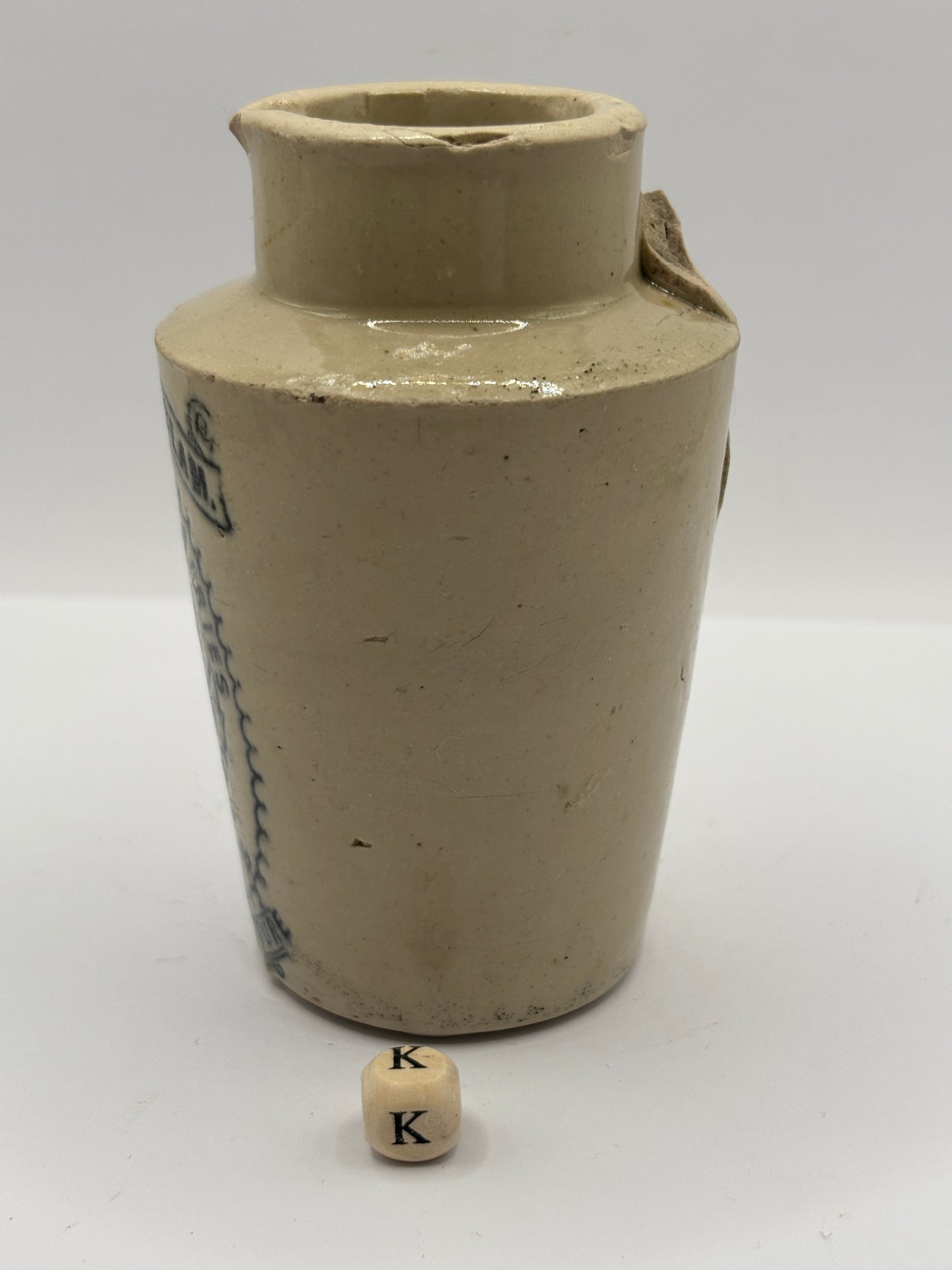Old stoneware advertising cream pot. Provencial dairies Leeds (k) damaged