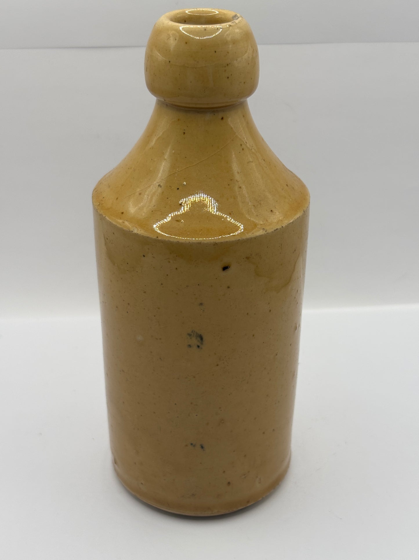 Old stoneware ginger beer bottle, Swansea united Breweries