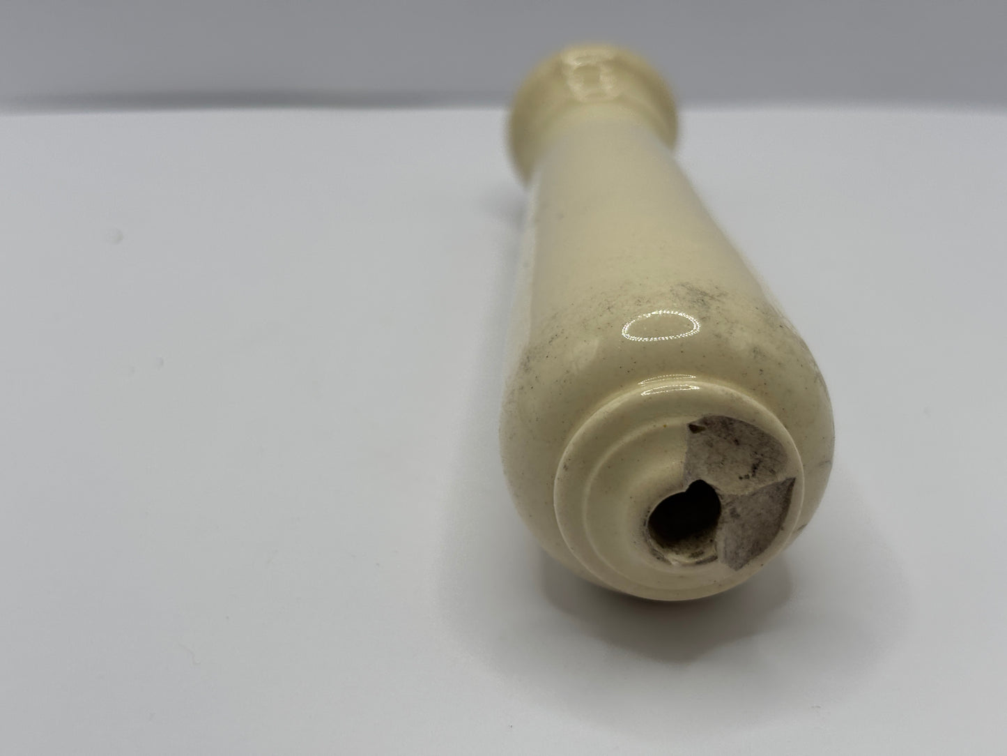 Old stoneware toilet pull damaged