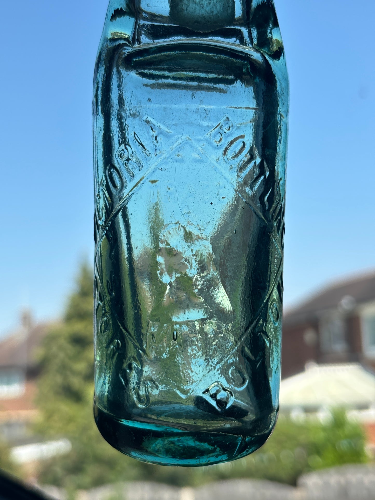 Old Bolton codd bottle, with marble. Victoria bottling stores