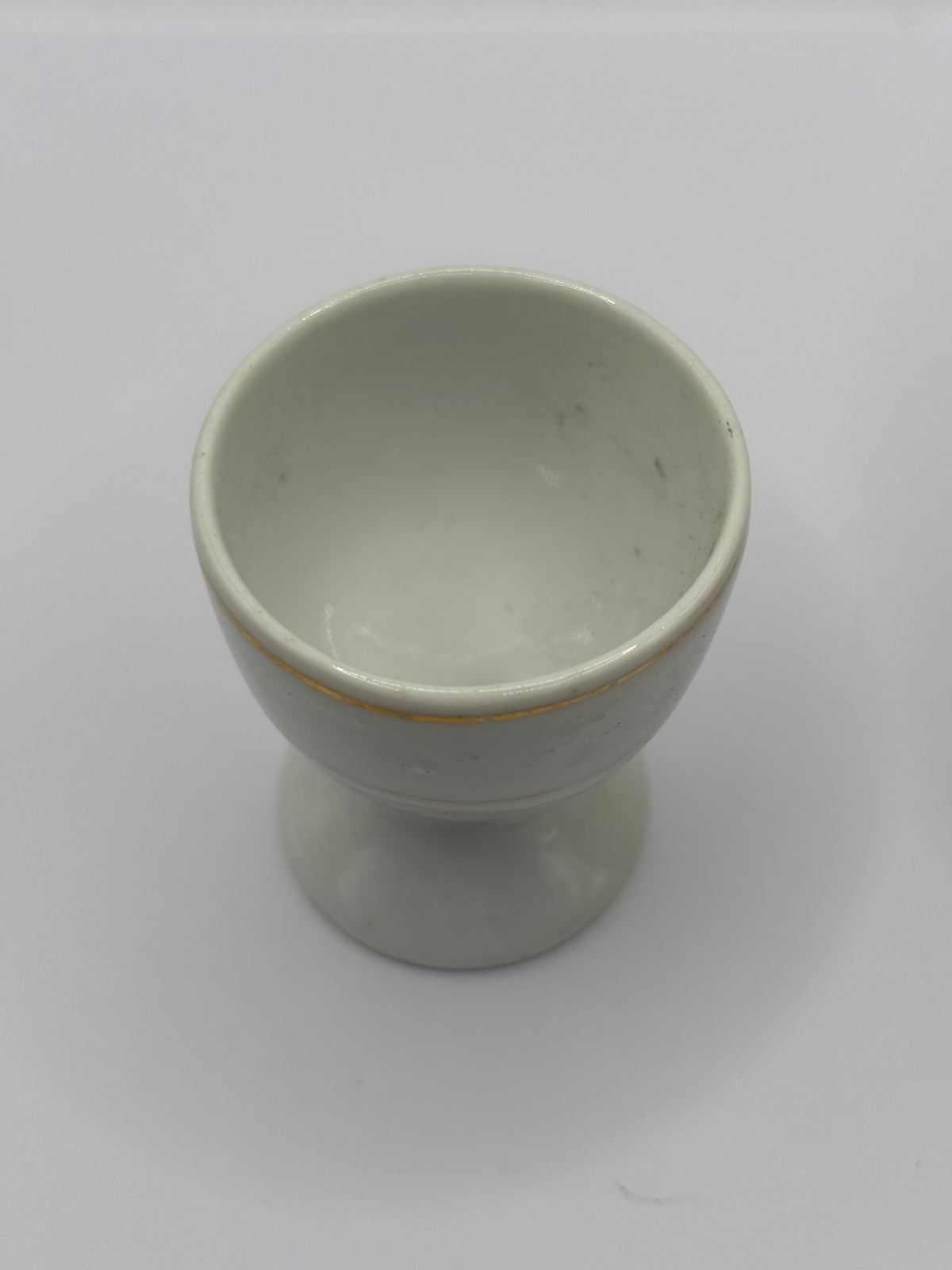 Old ceramic egg cup, dump dug