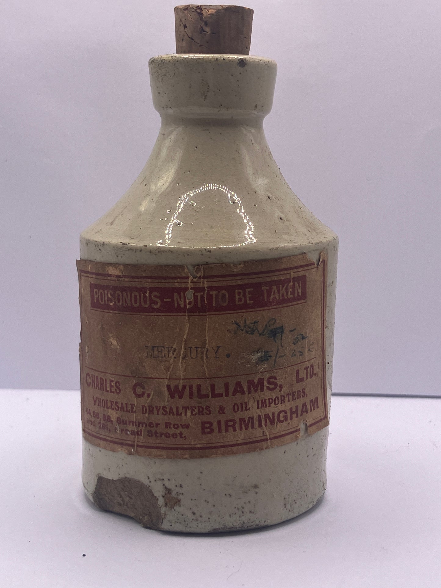 Stoneware jar with original label. Mercury