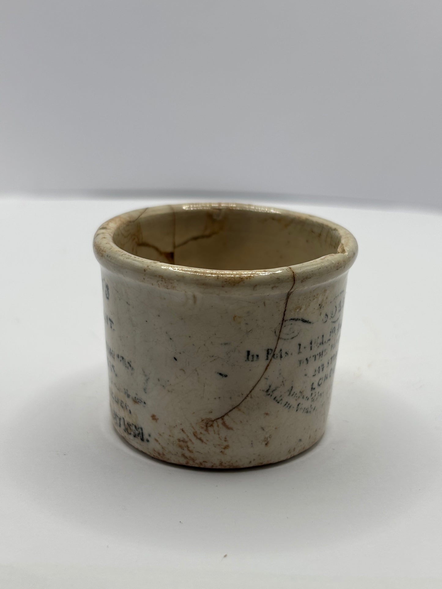 Old early Holloways advertising ointment pot
