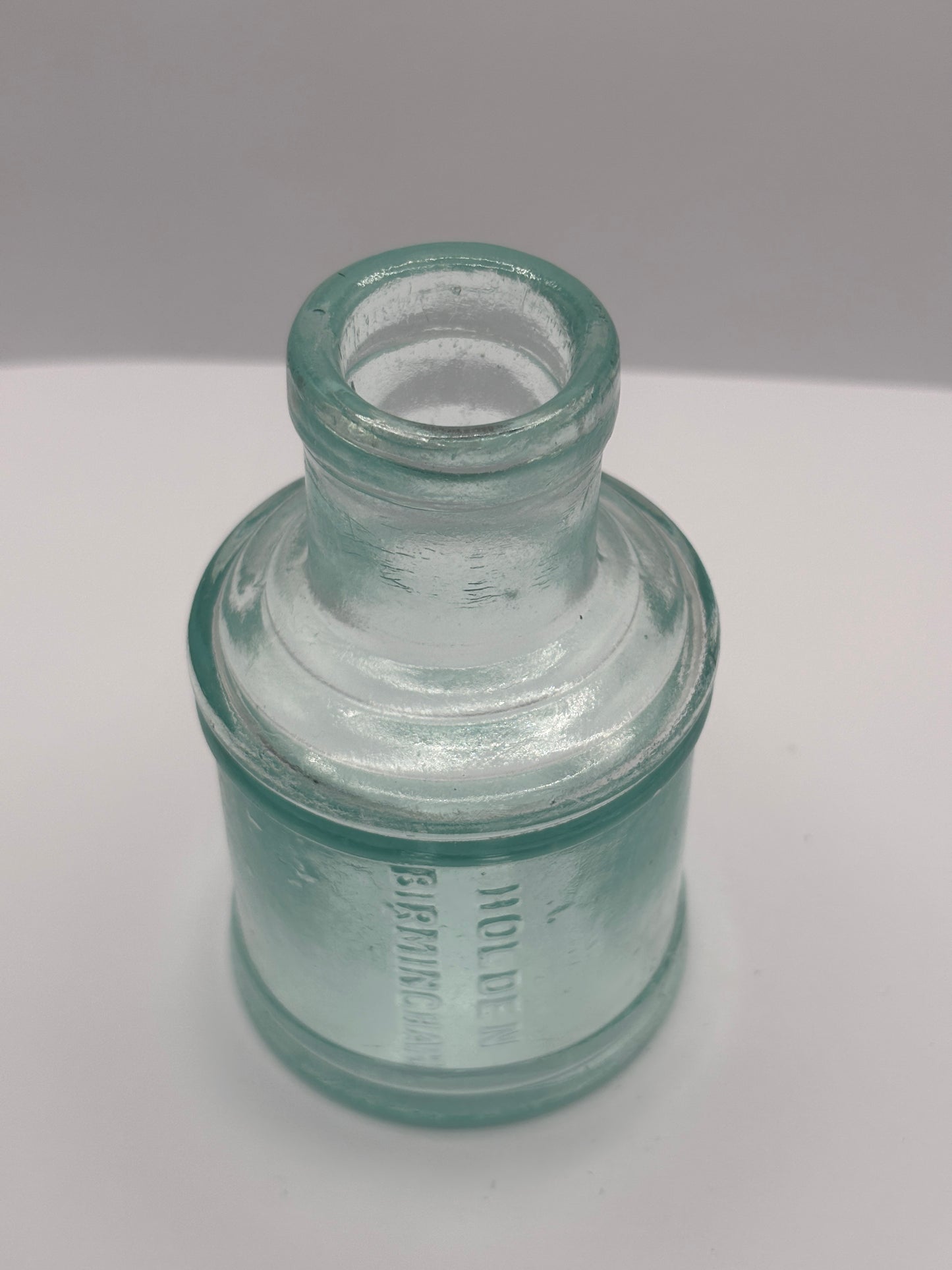 Old aqua glass advertising ink, ink bottle, inkwell. Holden Birmingham