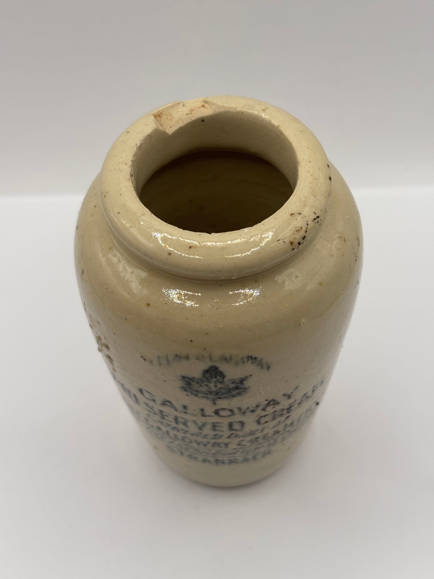 Old advertising cream pot, Galloway creamery Stranraer. Damaged