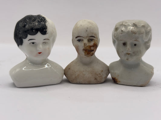 3 small crusty old dolls heads (1 x damaged)