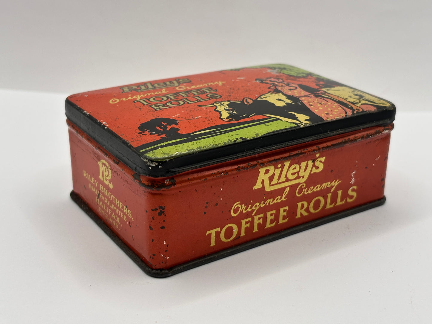 Old advertising tin, Rileys original creamy toffee rolls