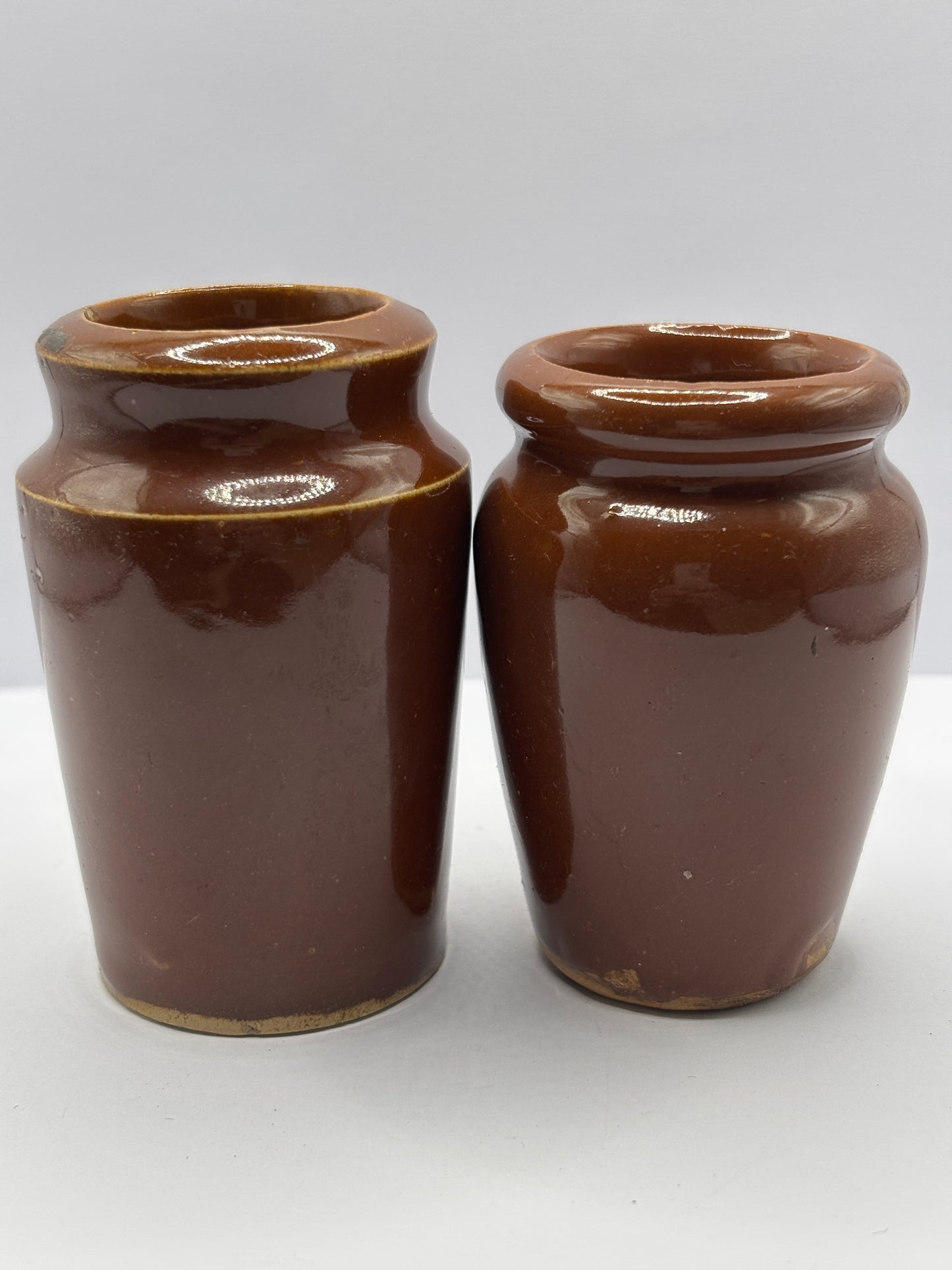 2 Old brown stoneware cream pots