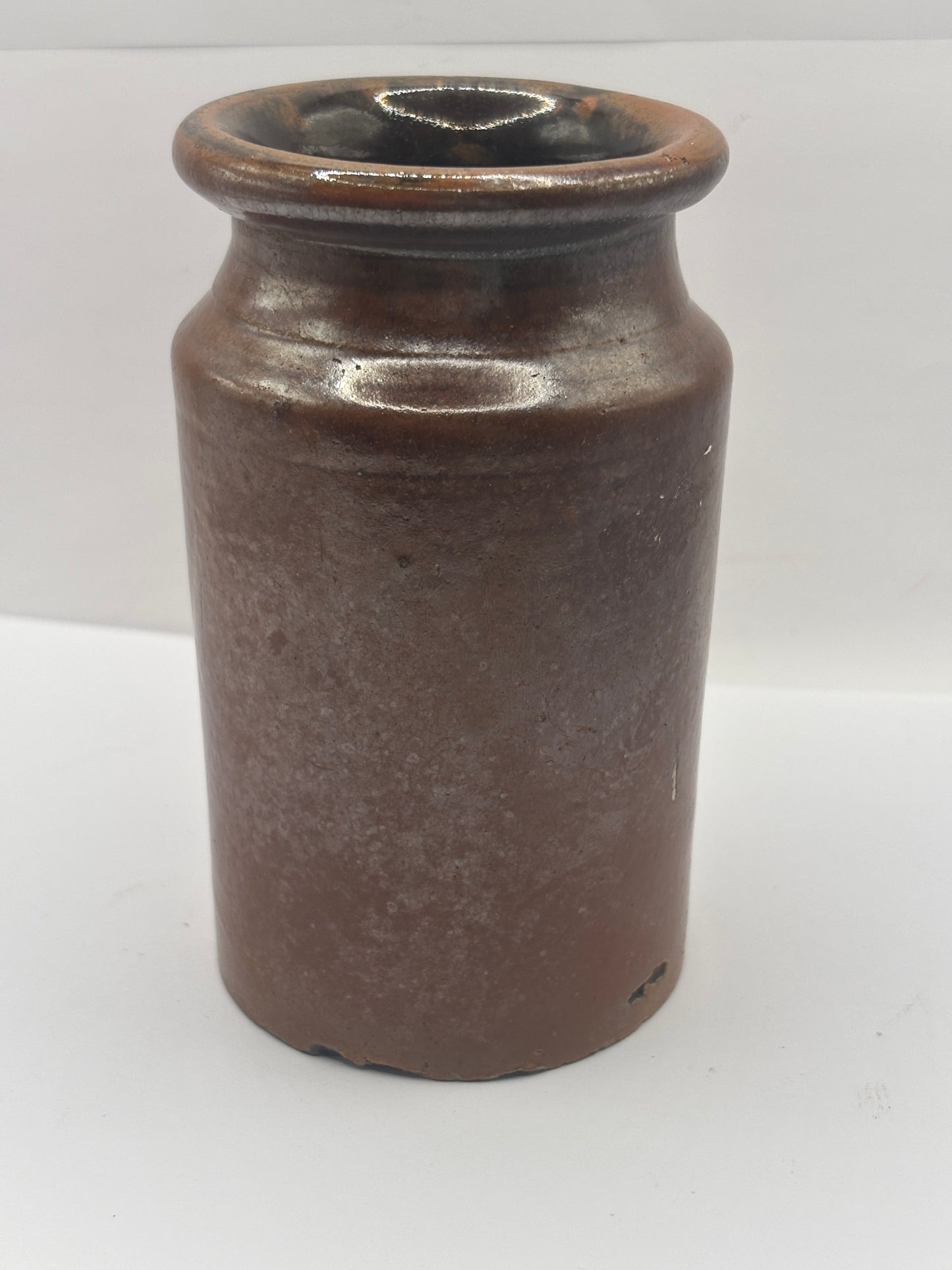 Old brown stoneware salt glaze jar