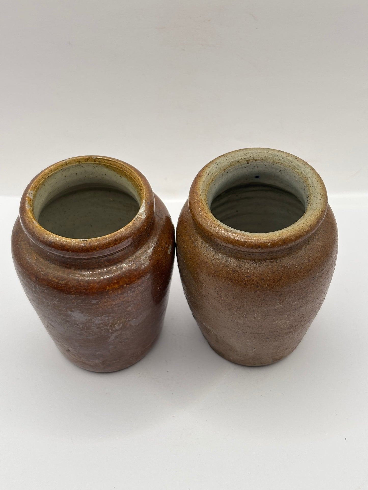 2 old brown stoneware cream pots