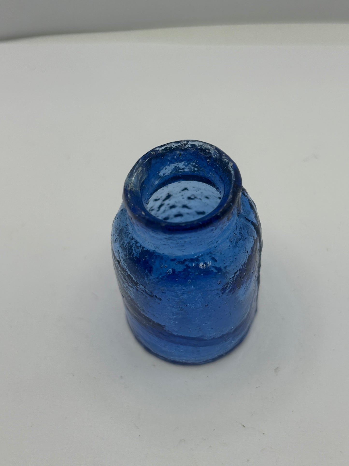 Small blue rat paste bottle