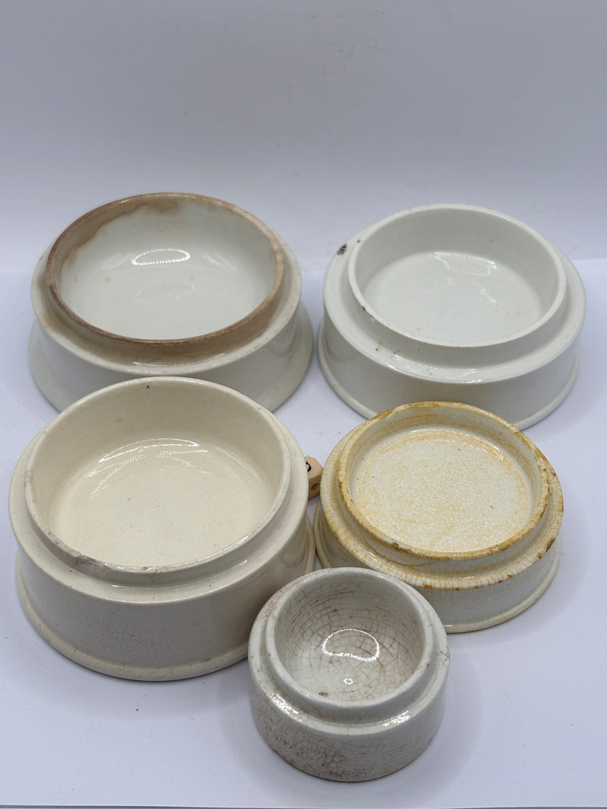 5 old stoneware pot lid bases, stackers (D)