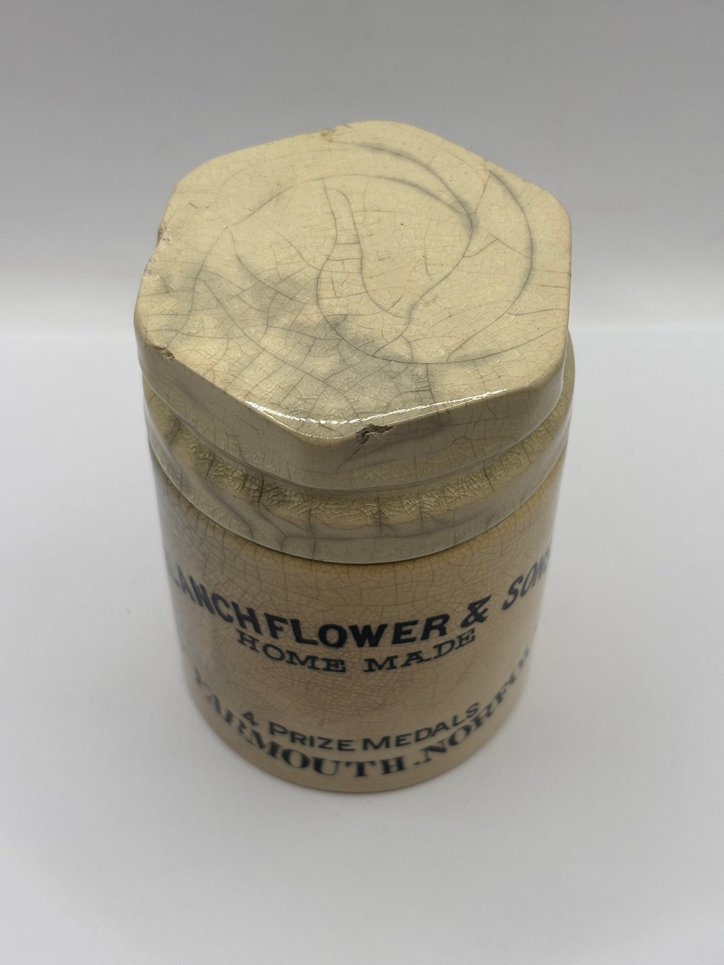 Old stoneware potted meat jar and lid. Blanchflower