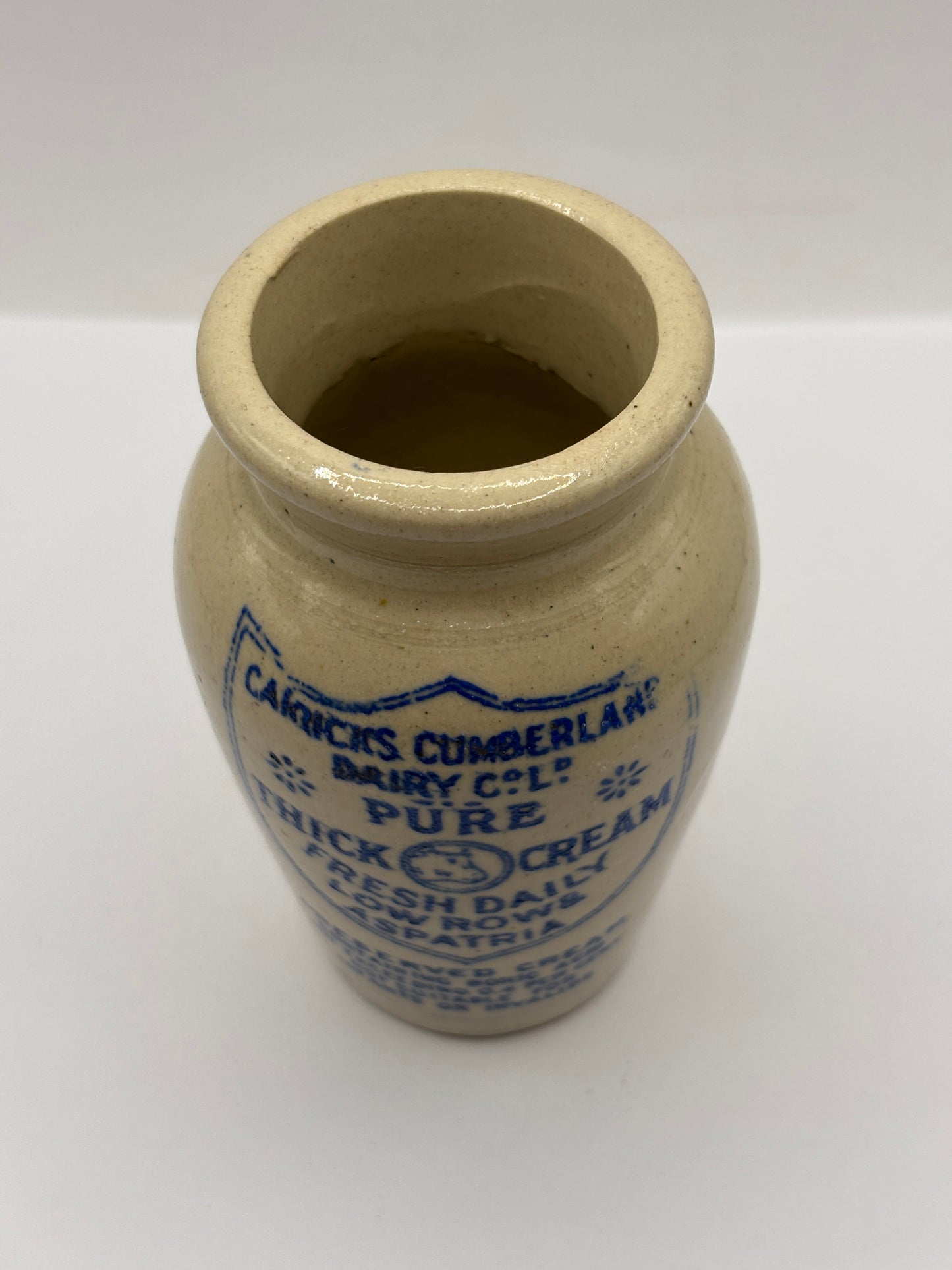 Old advertising cream pot, Carricks Cumberland dairy. Pure thick cream. Aspatria variation