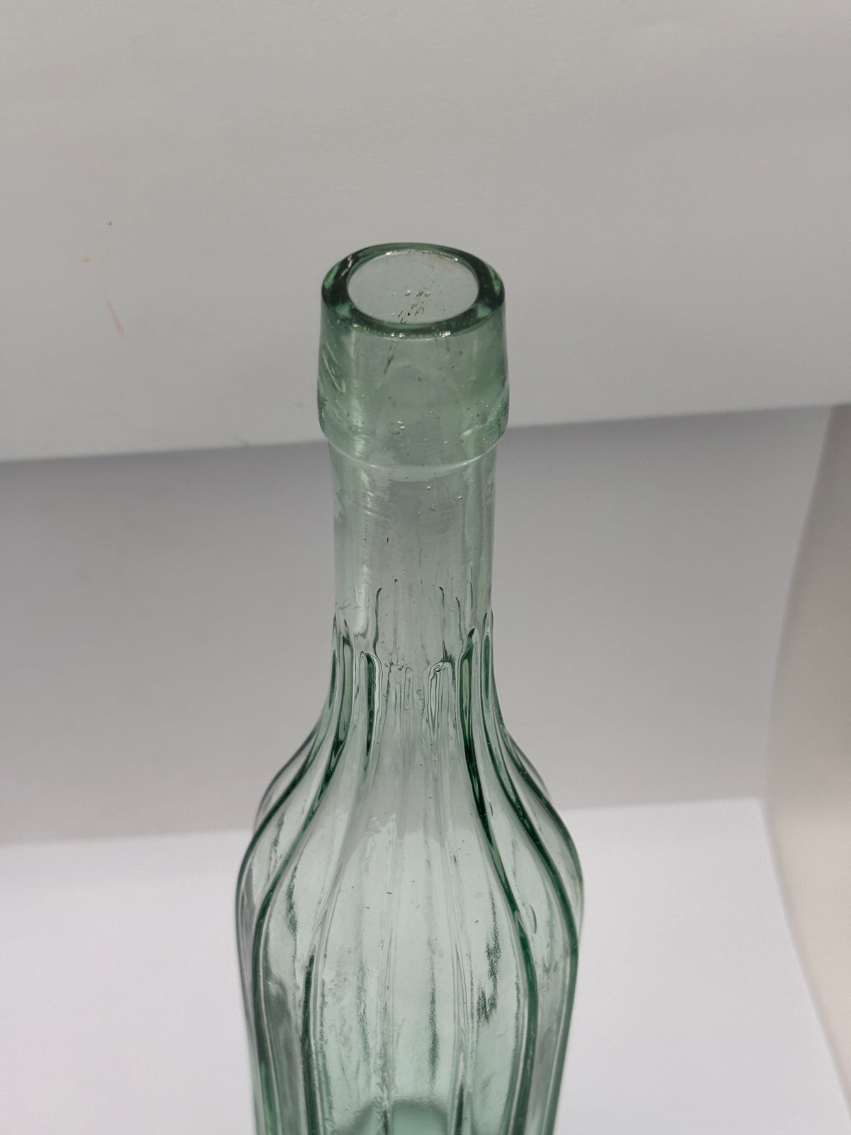 Old tall aqua glass bottle, vinegar?