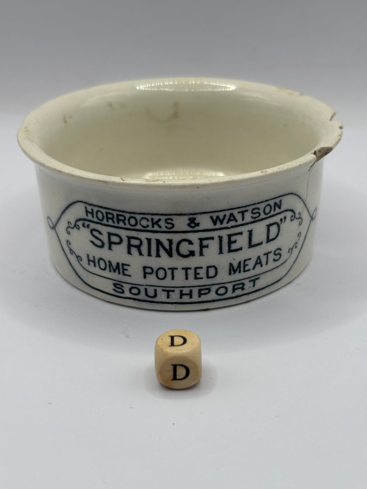 Old advertising meat paste pot, Springfield. Damaged (D)