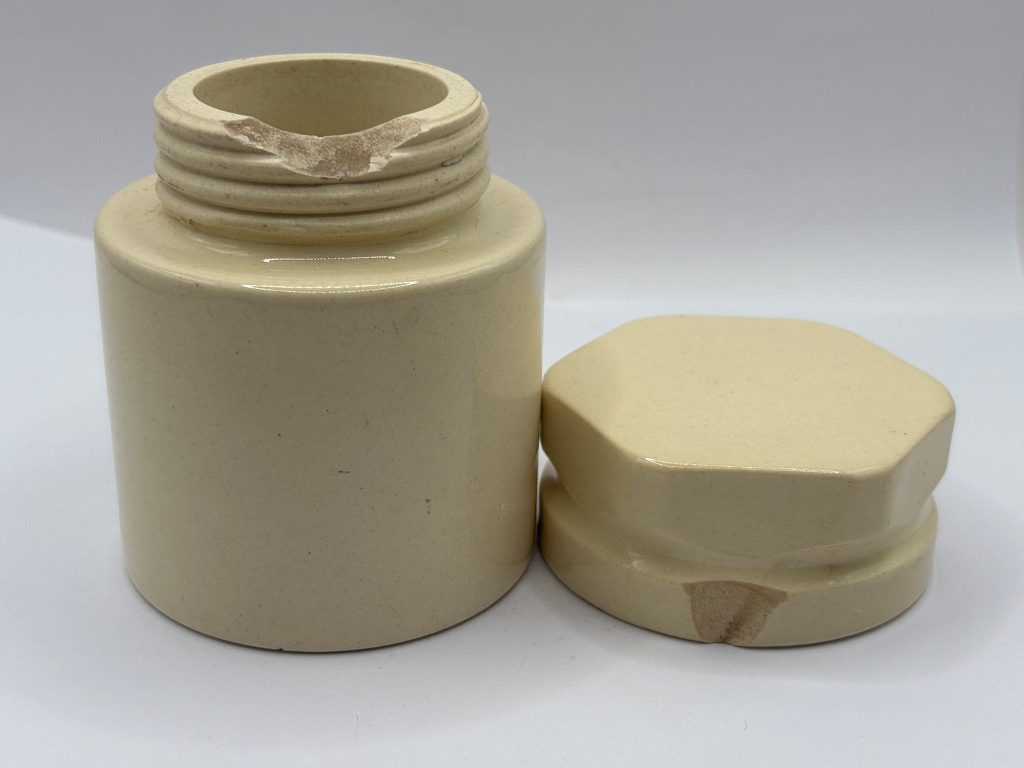 Old stoneware potted meat jar and lid. Blanchflower. Chipped