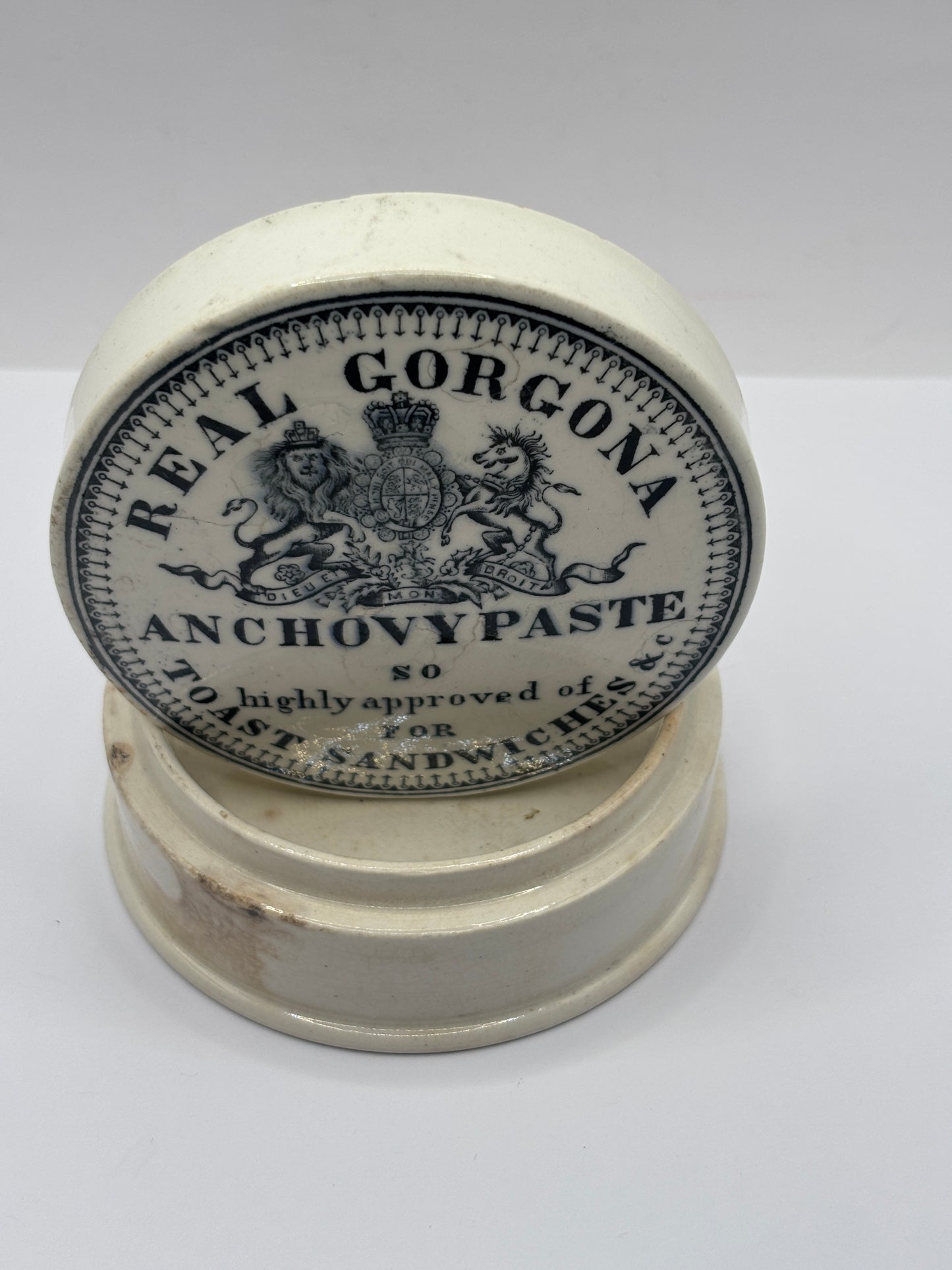 Old advertising lid and base. Real Gorgona anchovy paste. Chipped