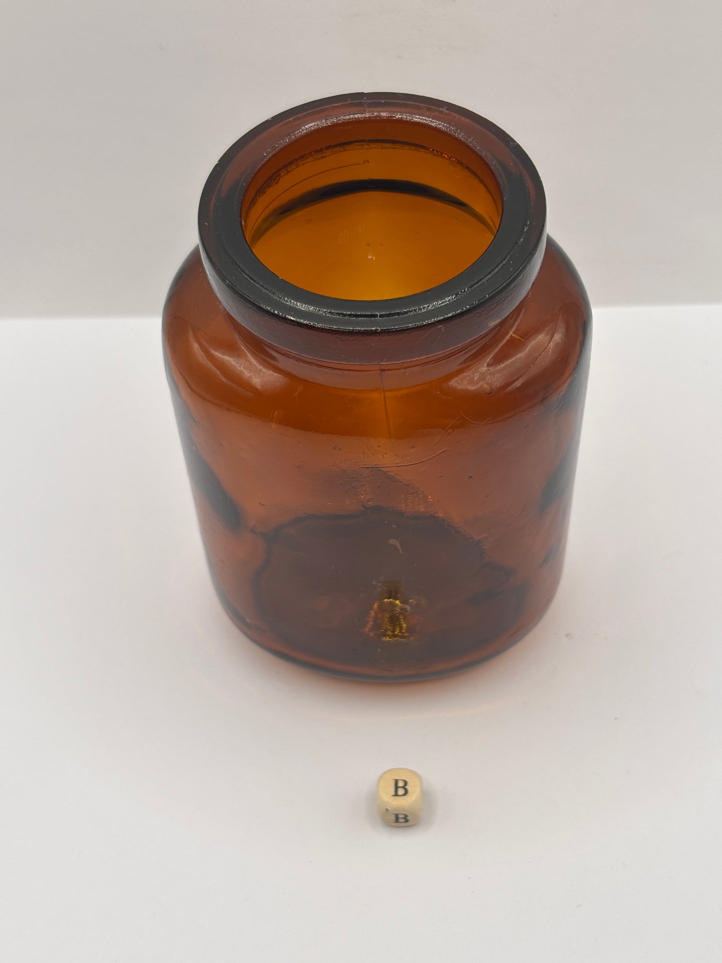 Old amber glass jar (B)