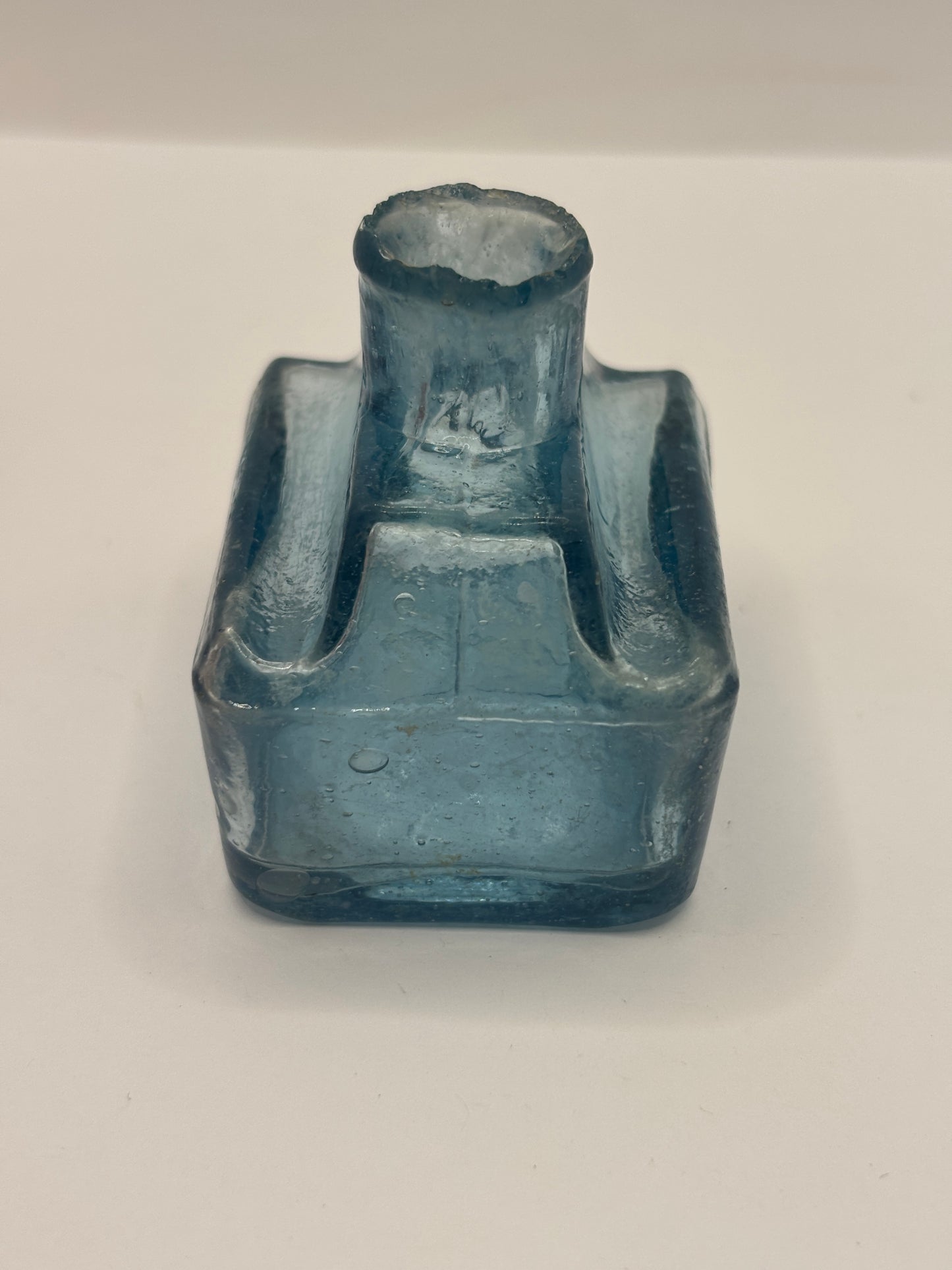Old blue glass inkwell, ink bottle, penny ink. Boat ink