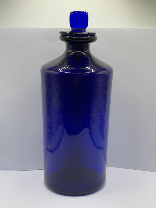 Old pontilled blue glass chemist jar, chemist round. Pharmacy