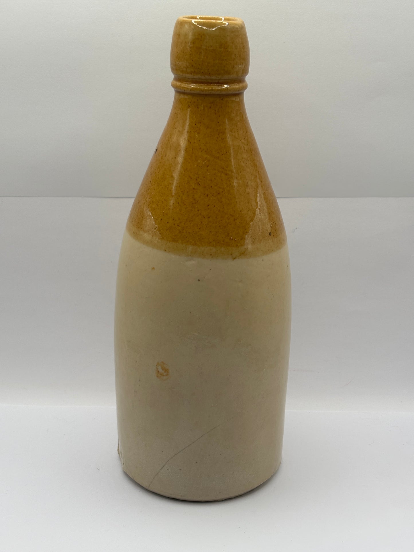 Old stoneware ginger beer bottle, Best London stout, Ventnor Isle of wight