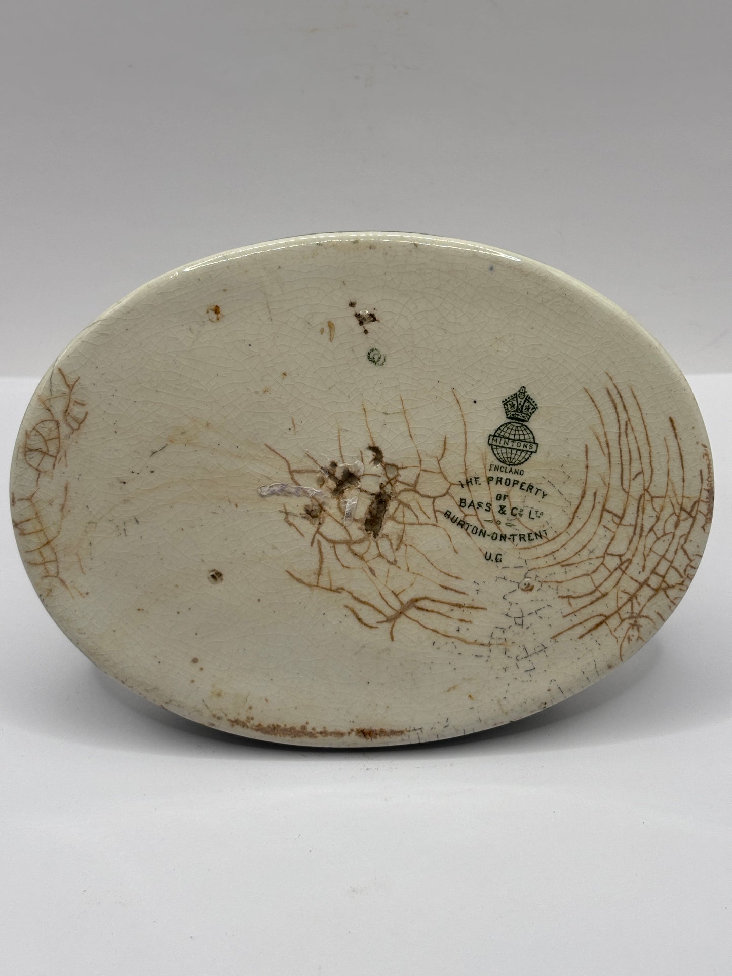 Old stoneware match striker. Bass bottled beer. Damages