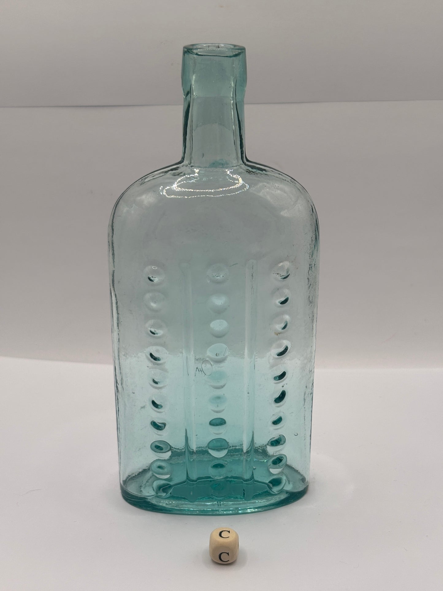 Old aqua glass poison bottle, (c)