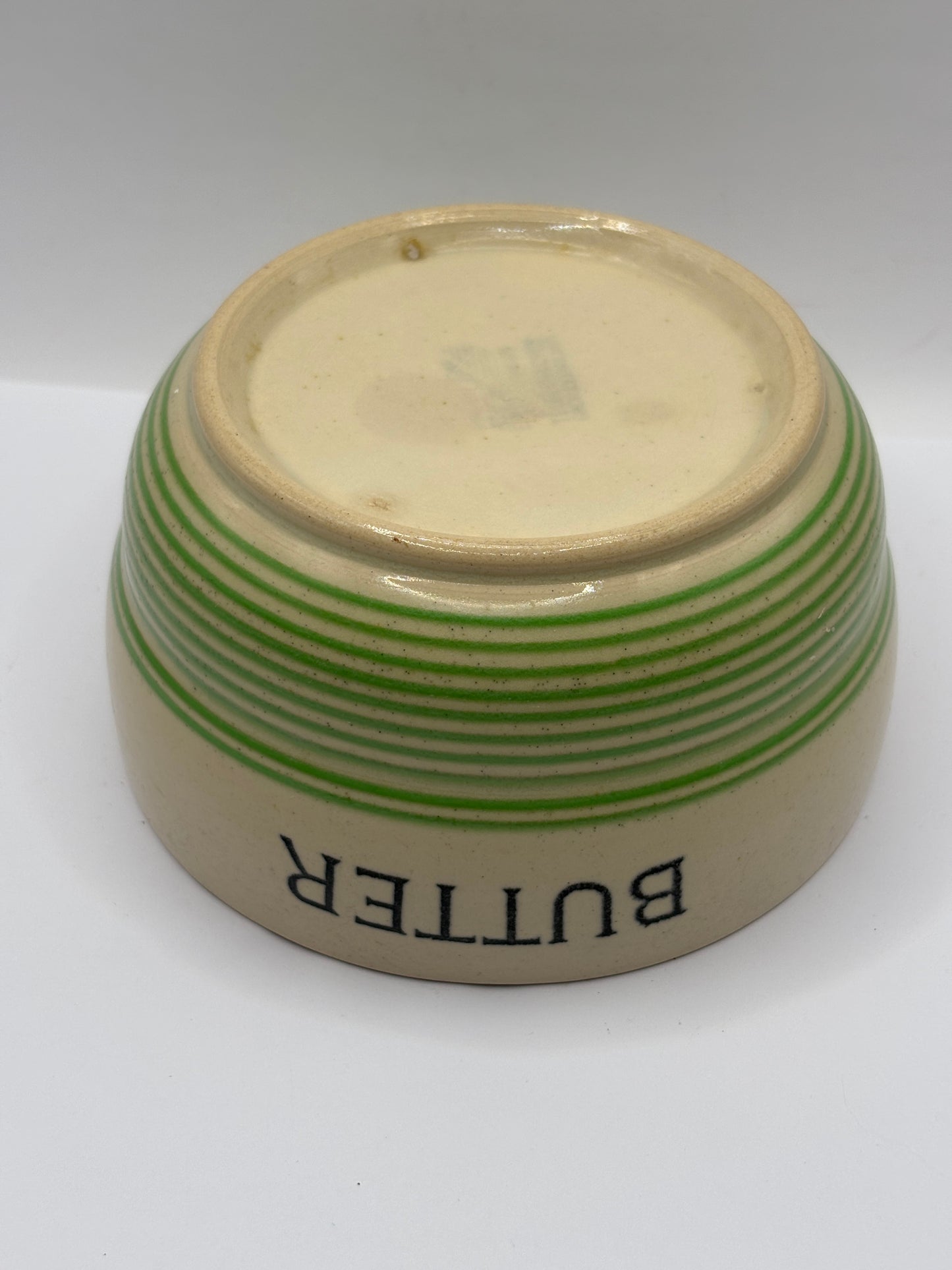 Old stoneware butter dish, no lid. Stained