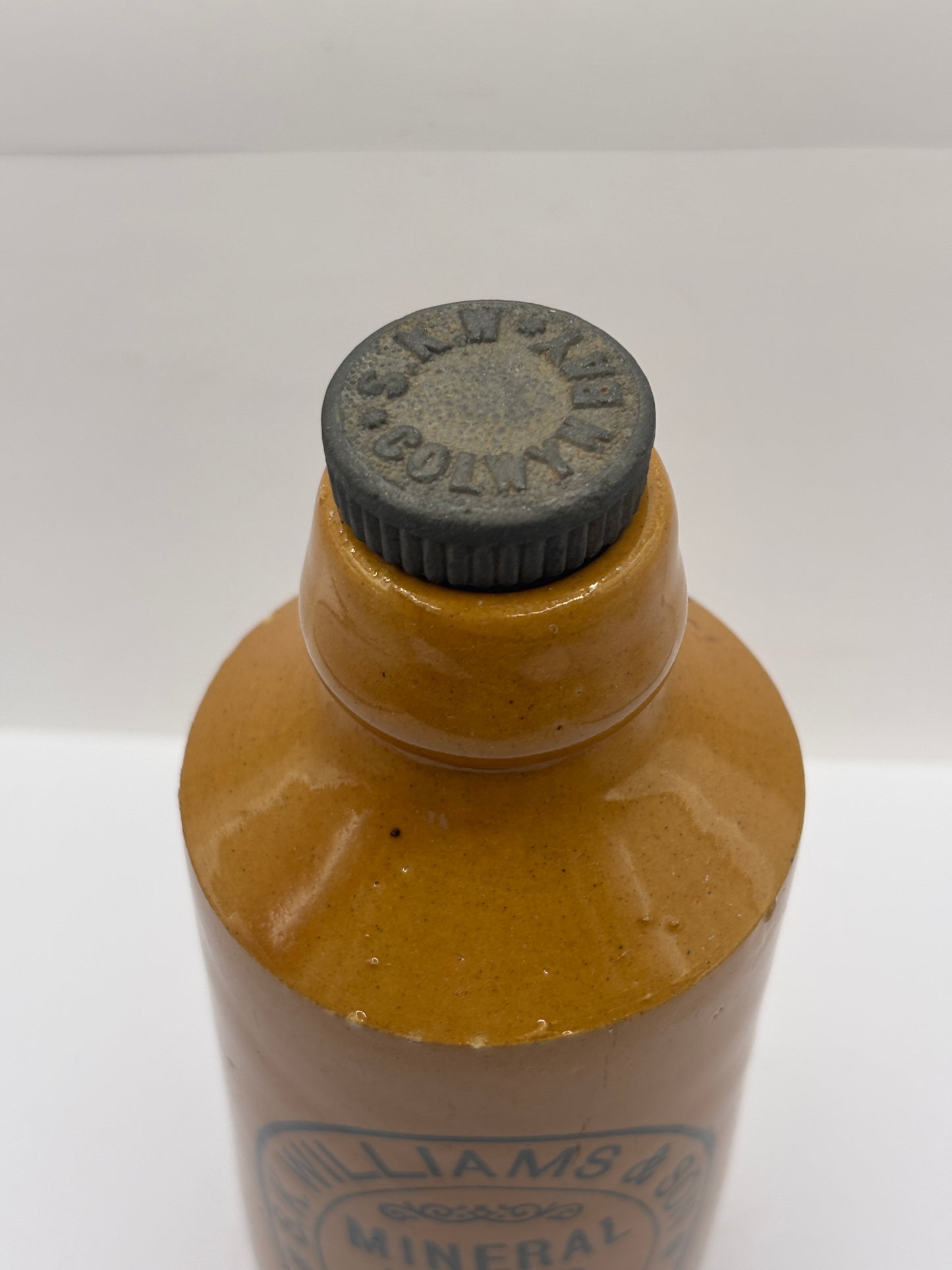 Old stoneware ginger beer bottle, K.Williams & son. Colwyn Bay