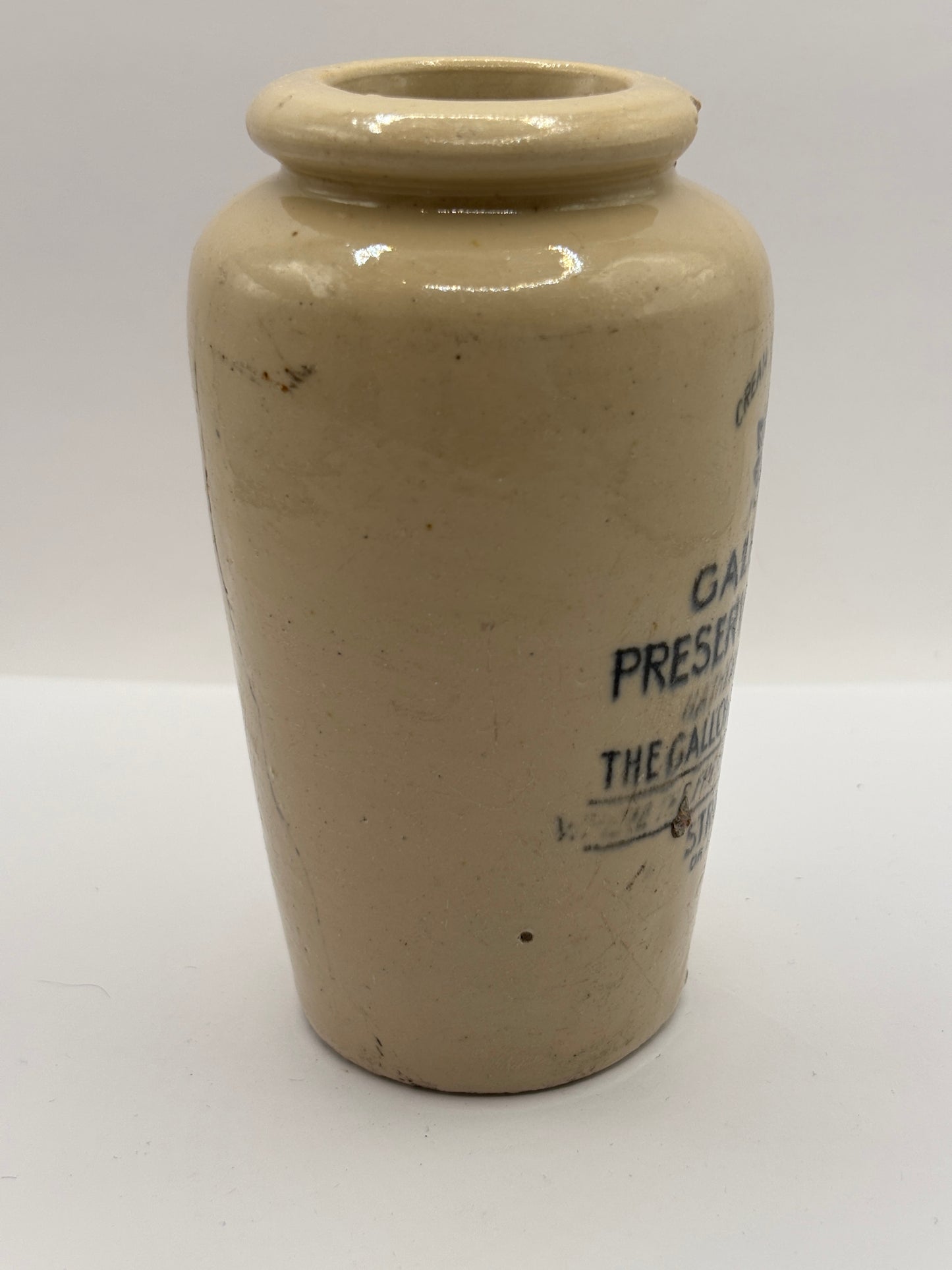 Old advertising cream pot, Galloway preserved cream. Damaged
