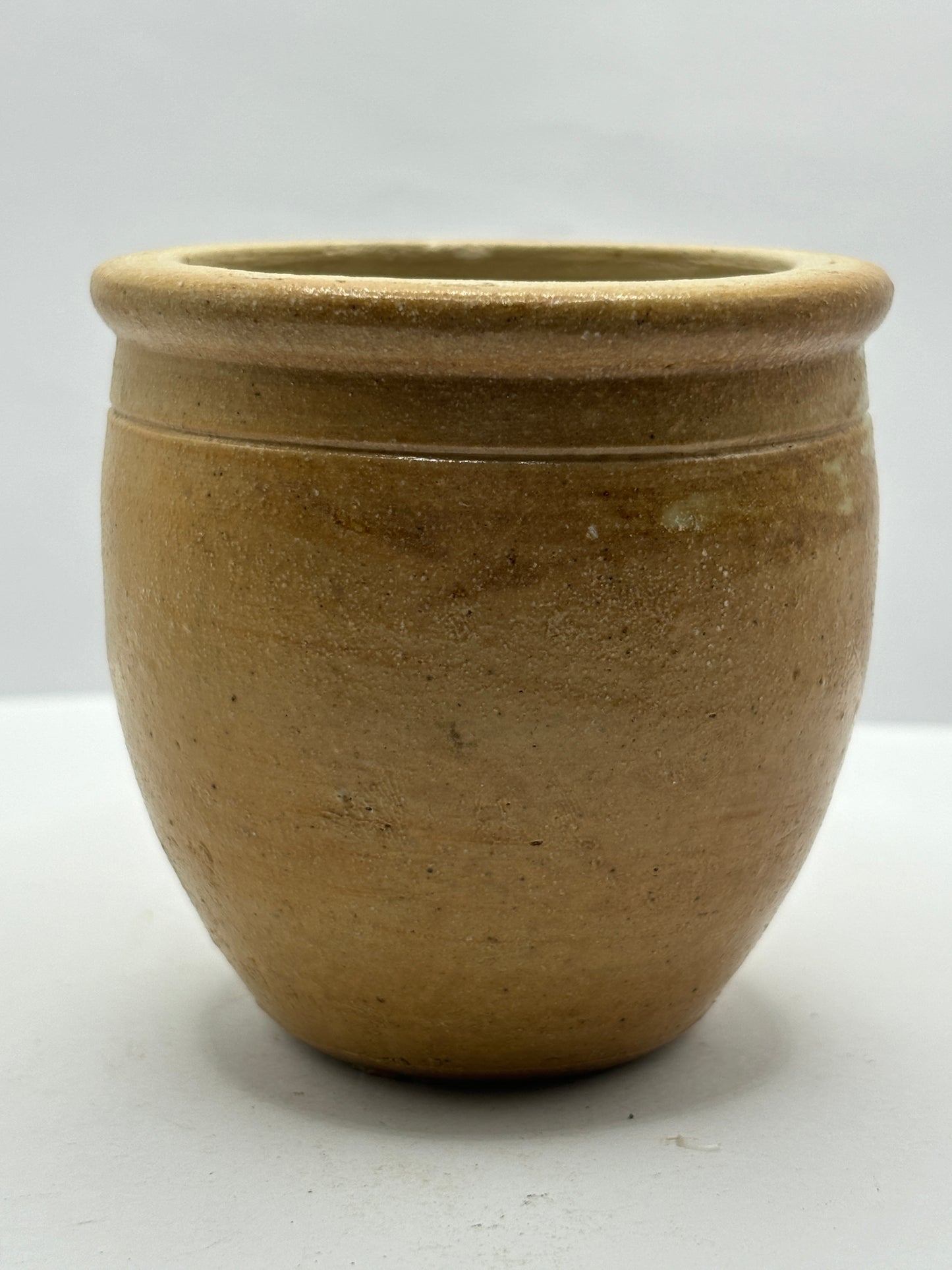 Small brown stoneware bowl