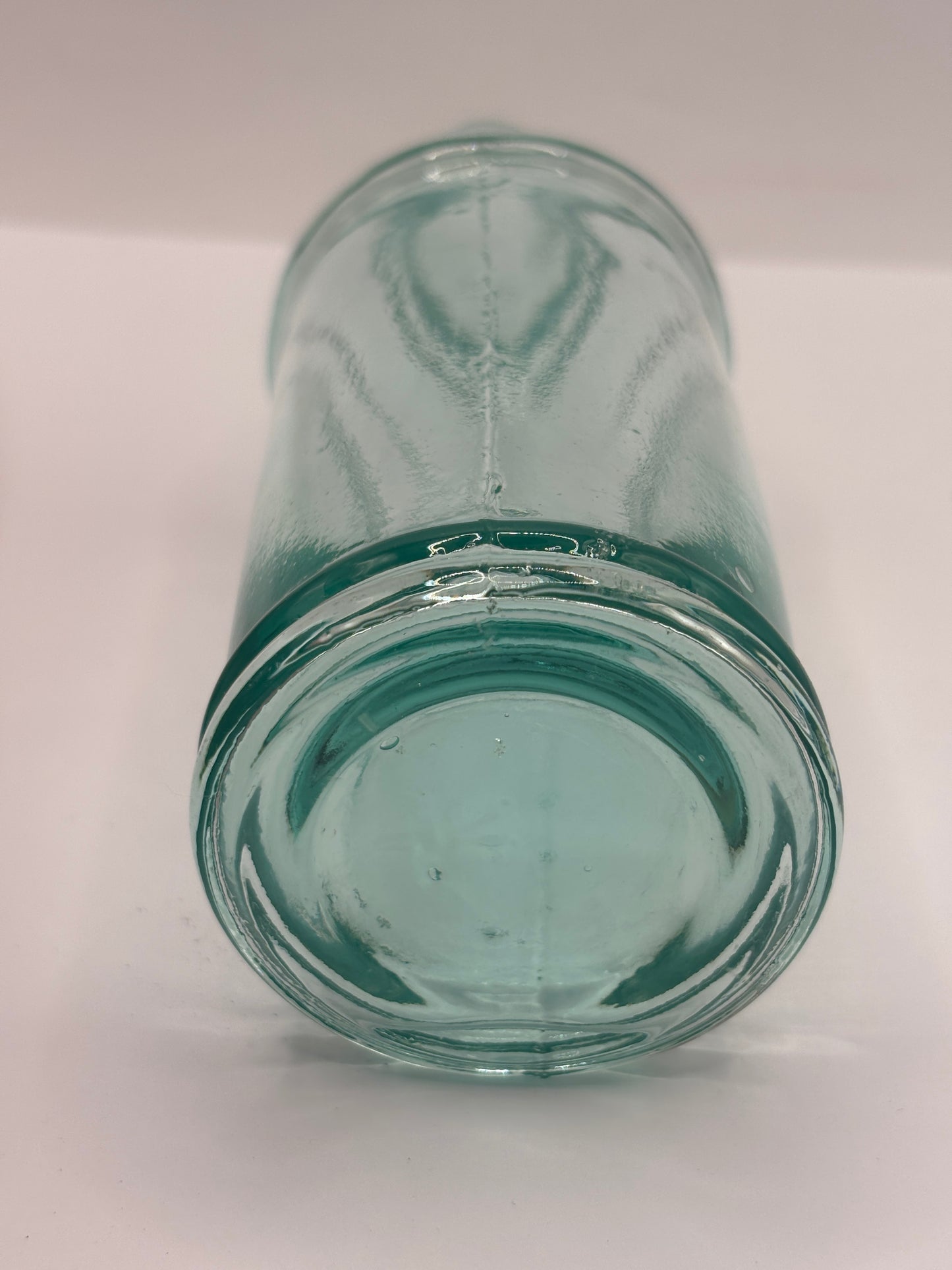Old tall aqua glass pouring ink, inkwell