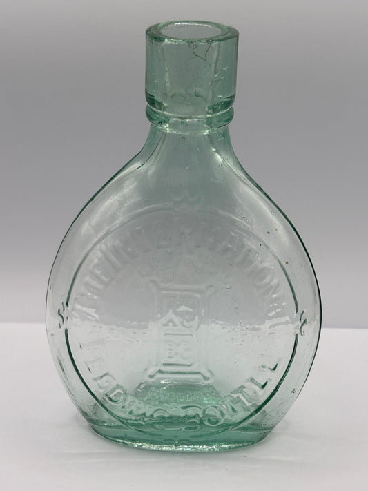 Old aqua glass baby feeder. The international feeder