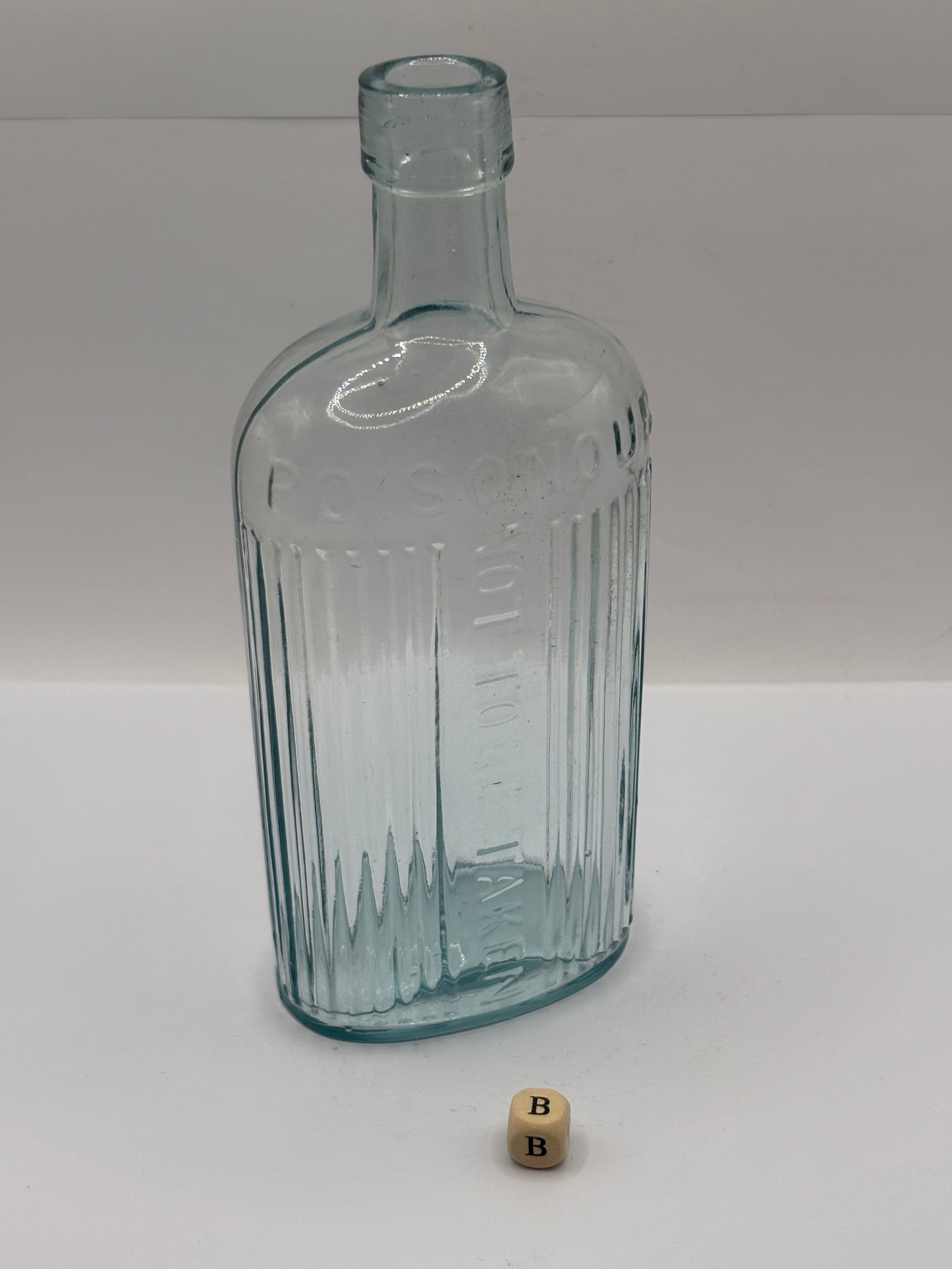 old aqua glass poison bottle, POISONOUS not to be taken (B)
