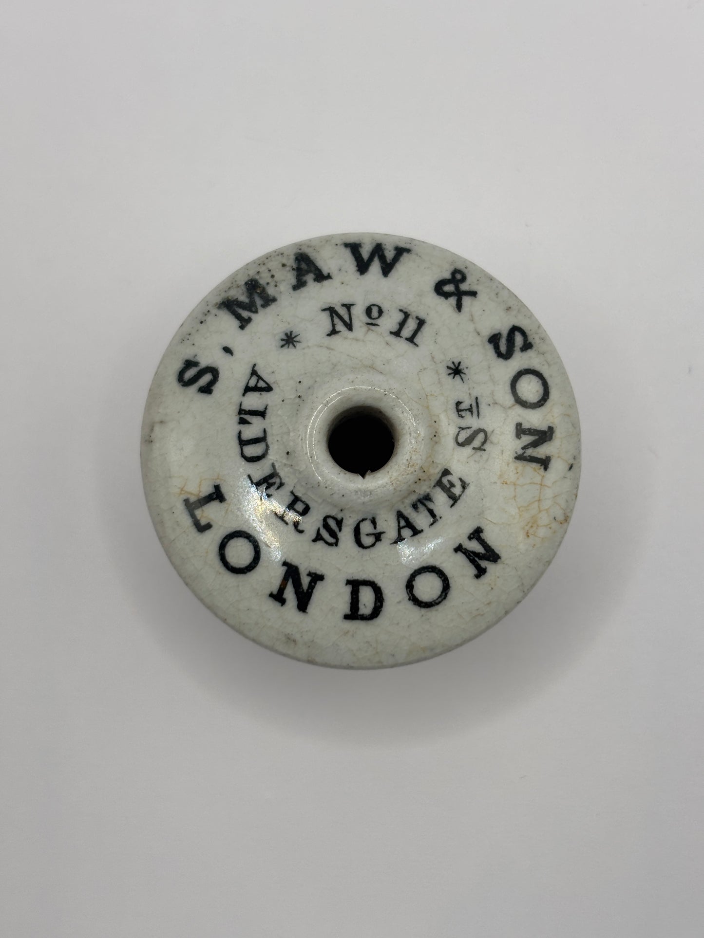 Old advertising baby feeder lid, S maw & son