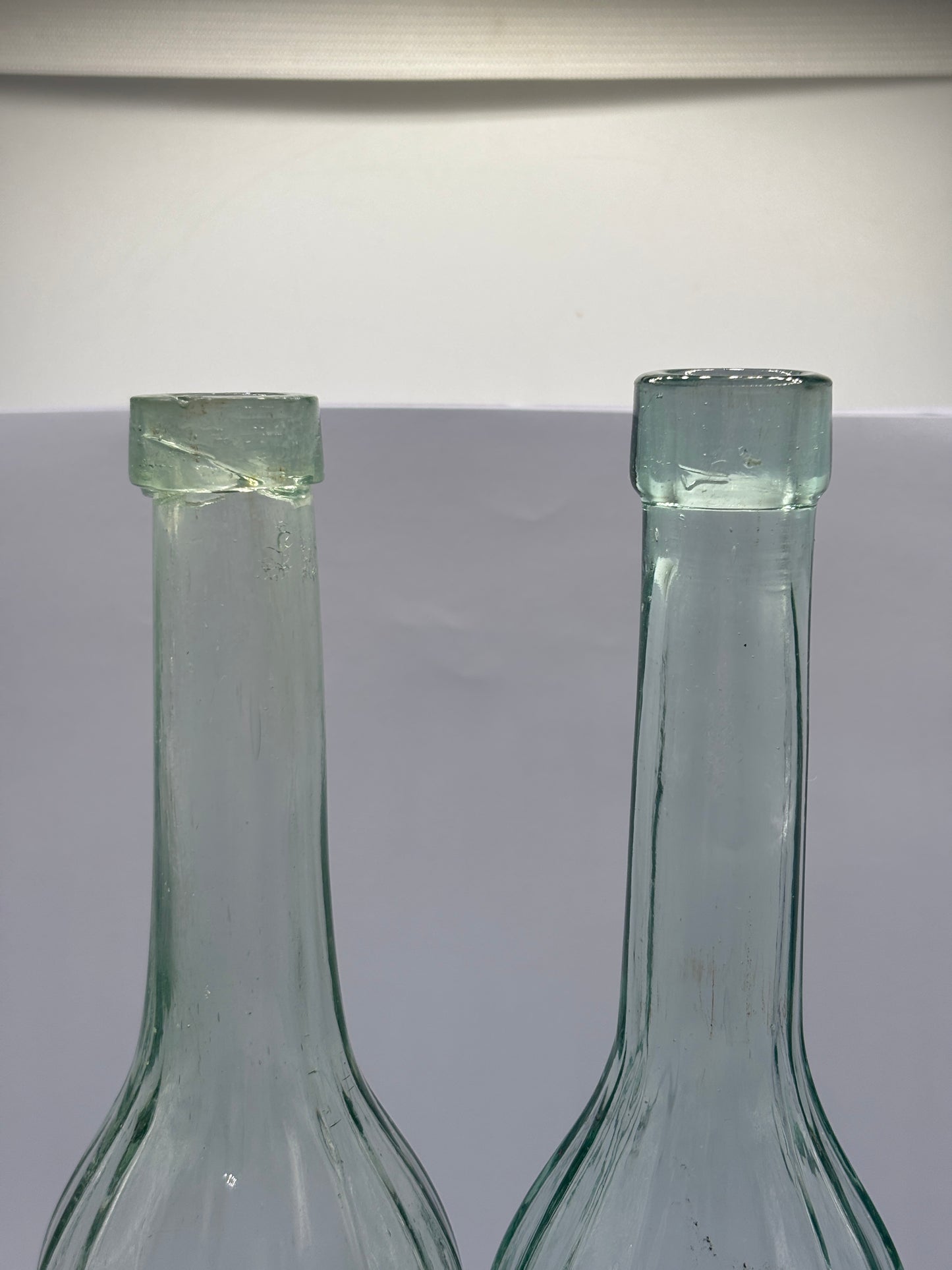 2 old aqua glass chemist bottles