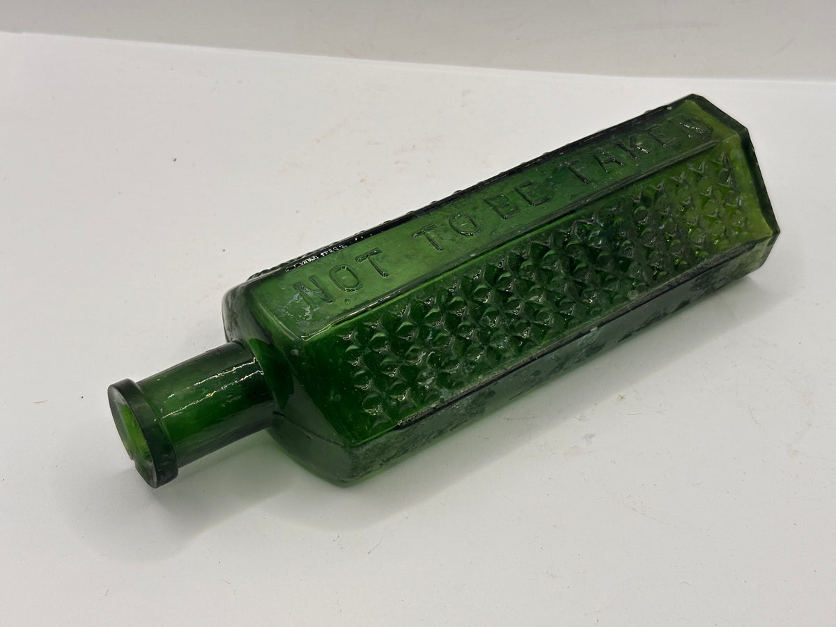 Old crusty green flat back poison bottle, Not to be taken