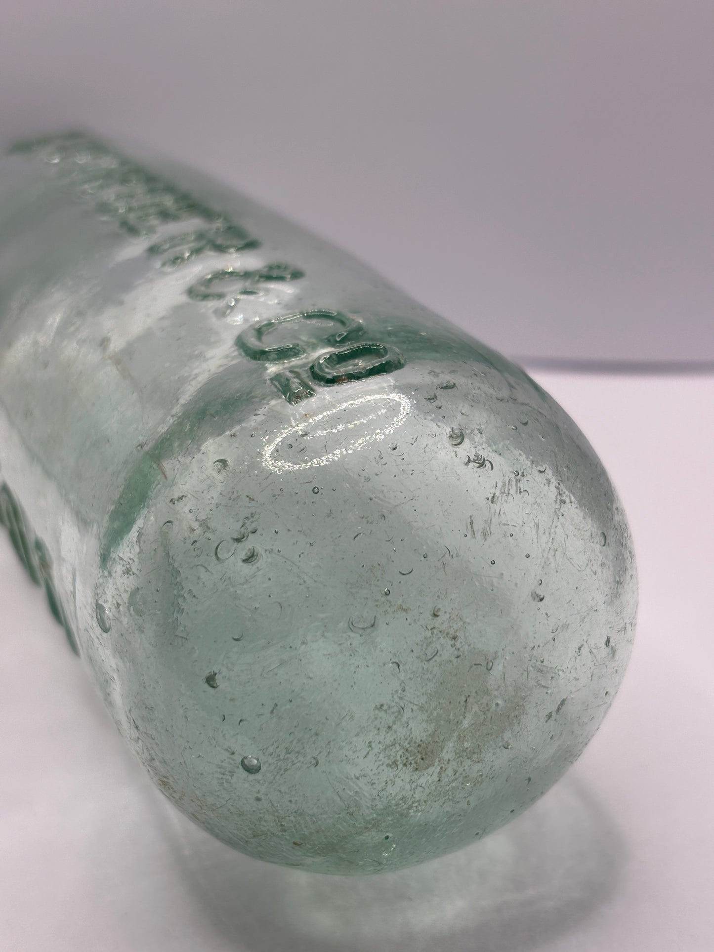 Old round bottom cylinder bottle, Sworder & Co Luton
