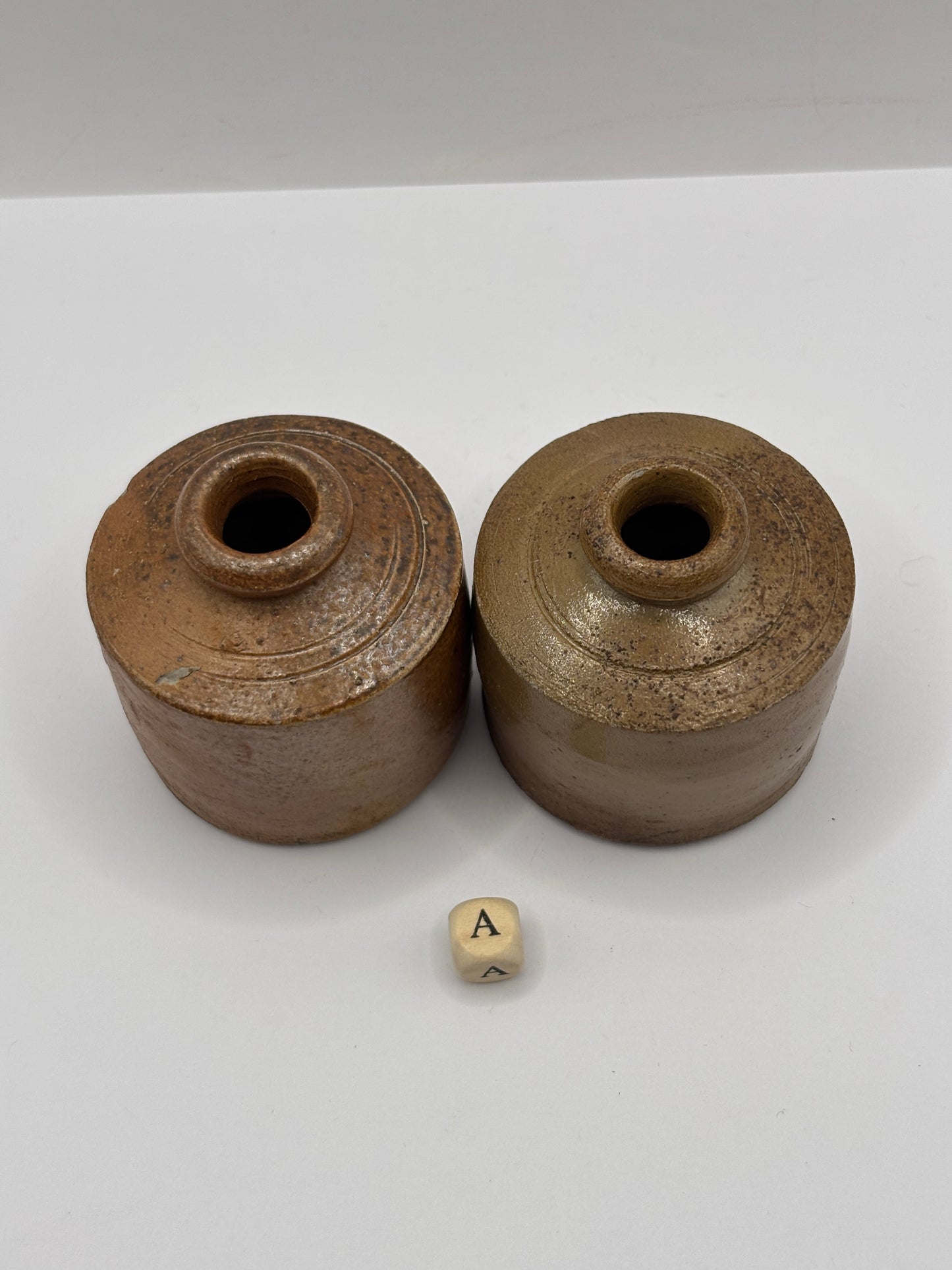 2 brown stoneware inkwells, ink bottles (A) pork pie inks
