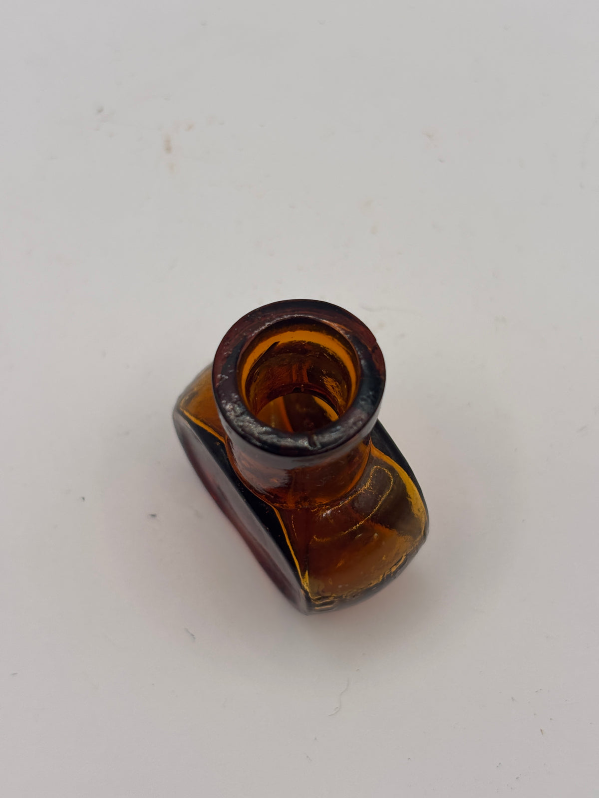 Old mini 1oz amber glass advertising Bovril bottle