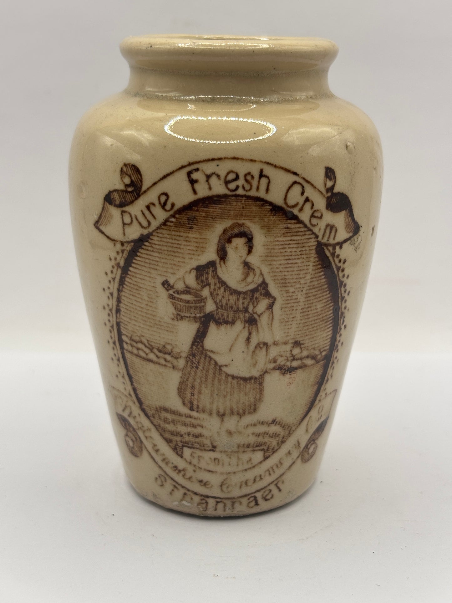 Old stoneware advertising cream pot, pure fresh cream Stranraer. Serpia print