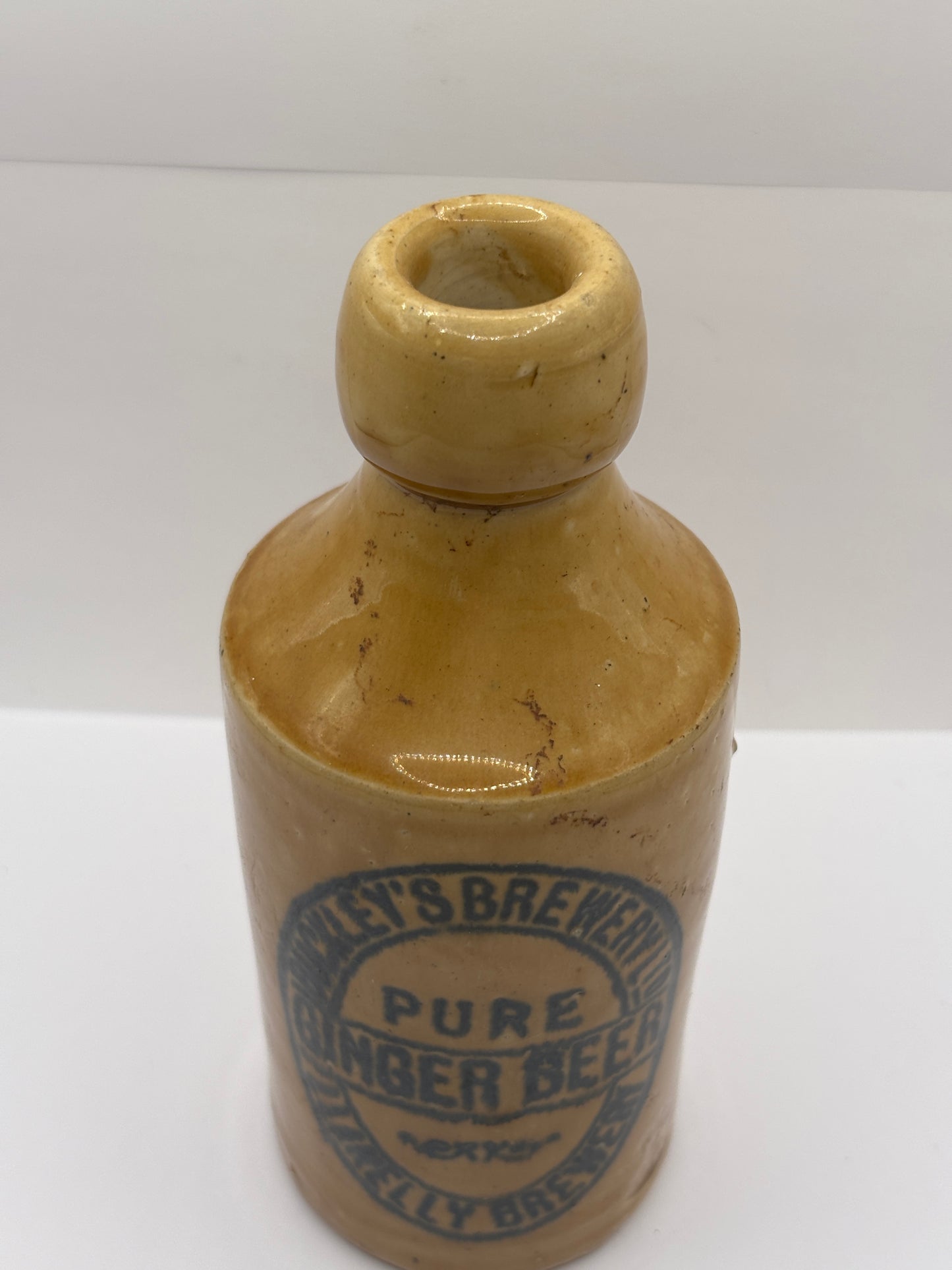 Old stoneware ginger beer bottle, Buckleys brewery, Pure ginger beer. Llanelly beewery