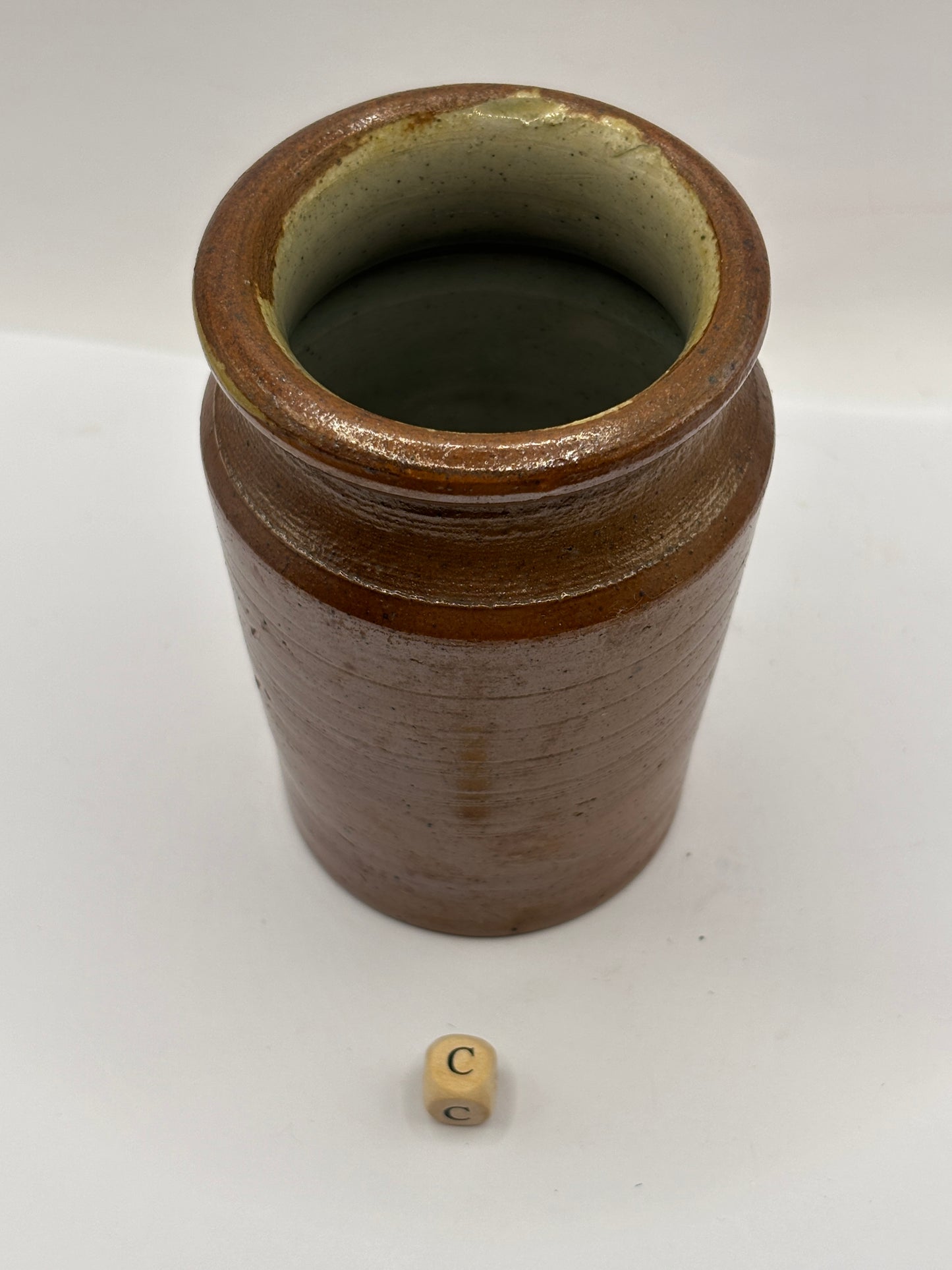 Old small brown stoneware jar (c) 11cms