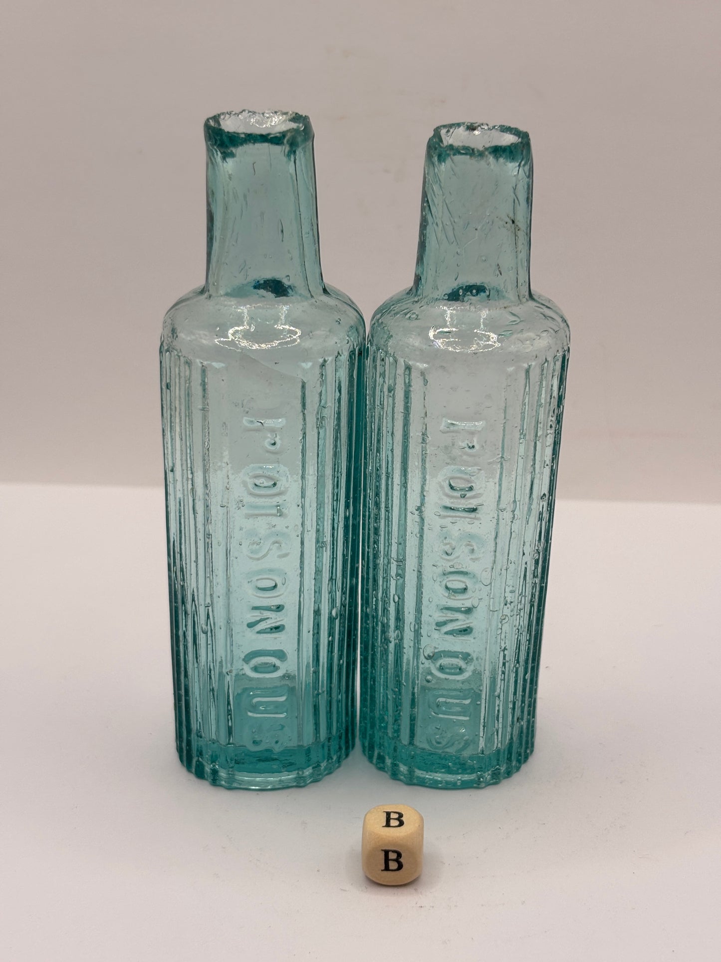 2 old aqua glass poison bottles, POISONOUS (B)
