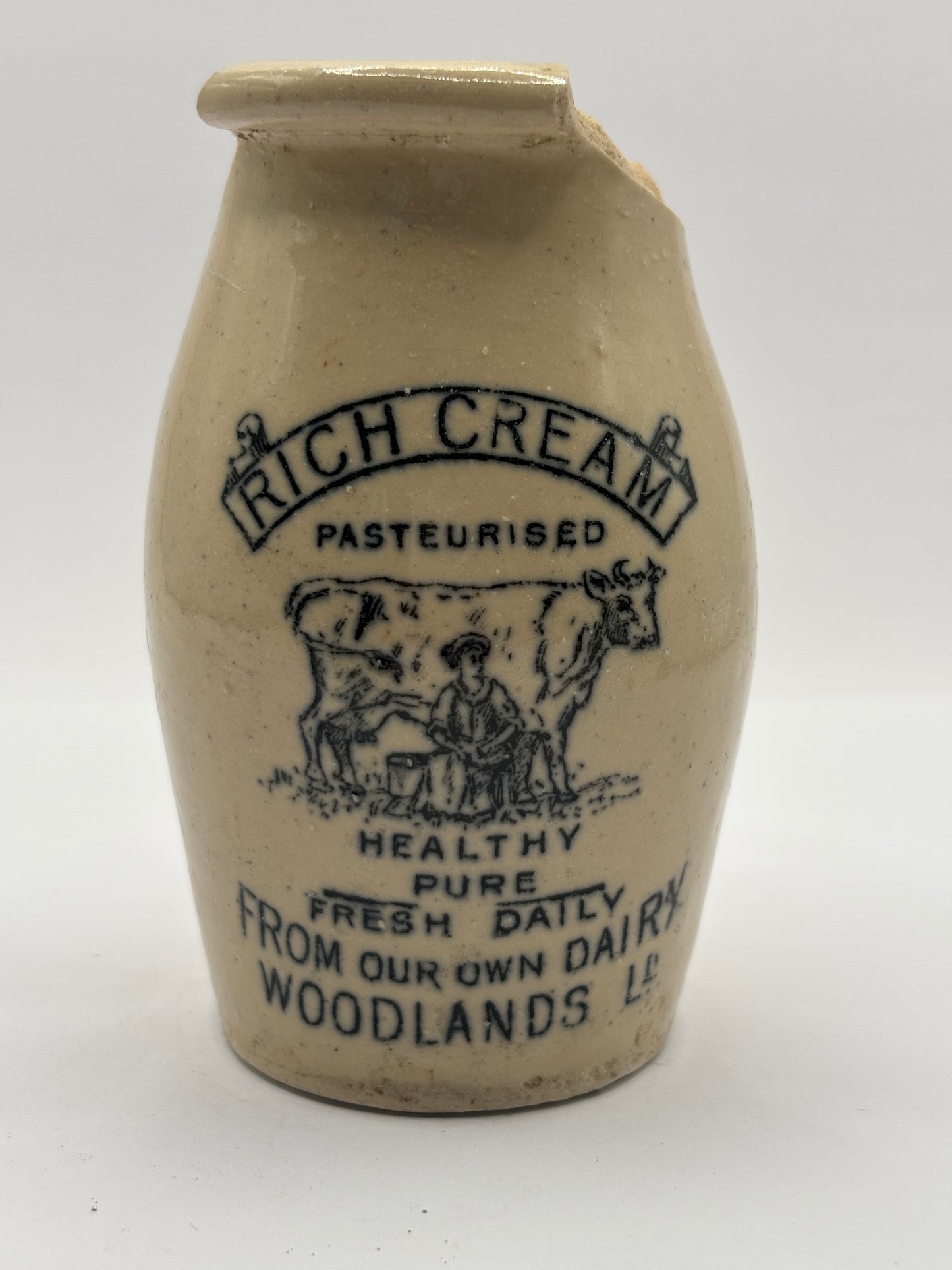 Old advertising cream pot,Woodlands dairy. DAMAGED