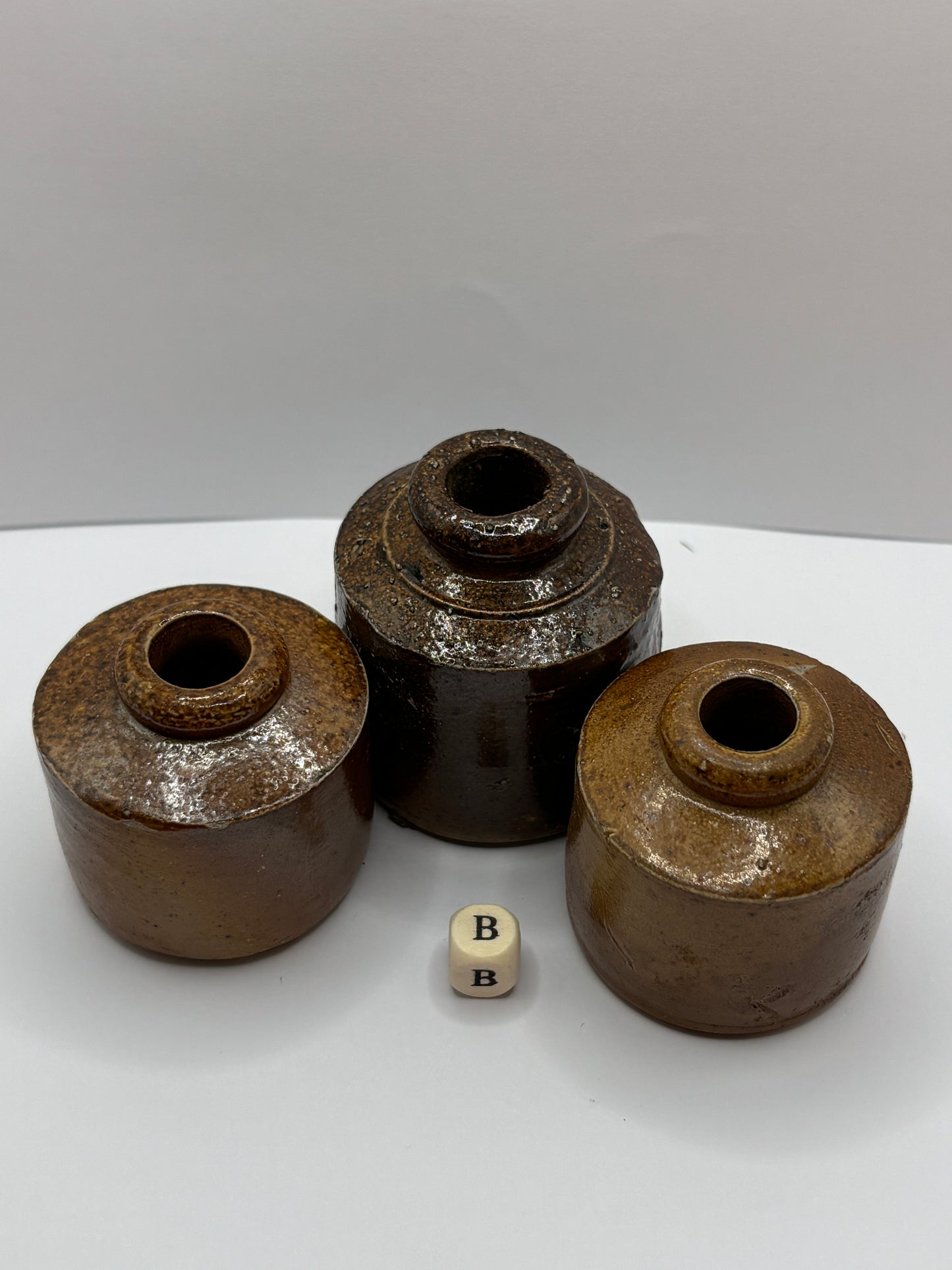 3 brown stoneware inkwells, pork pie inks (B)