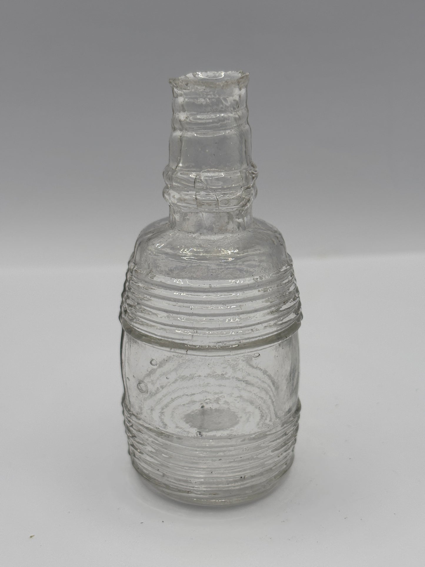 Old clear glass barrel ink bottle, inkwell